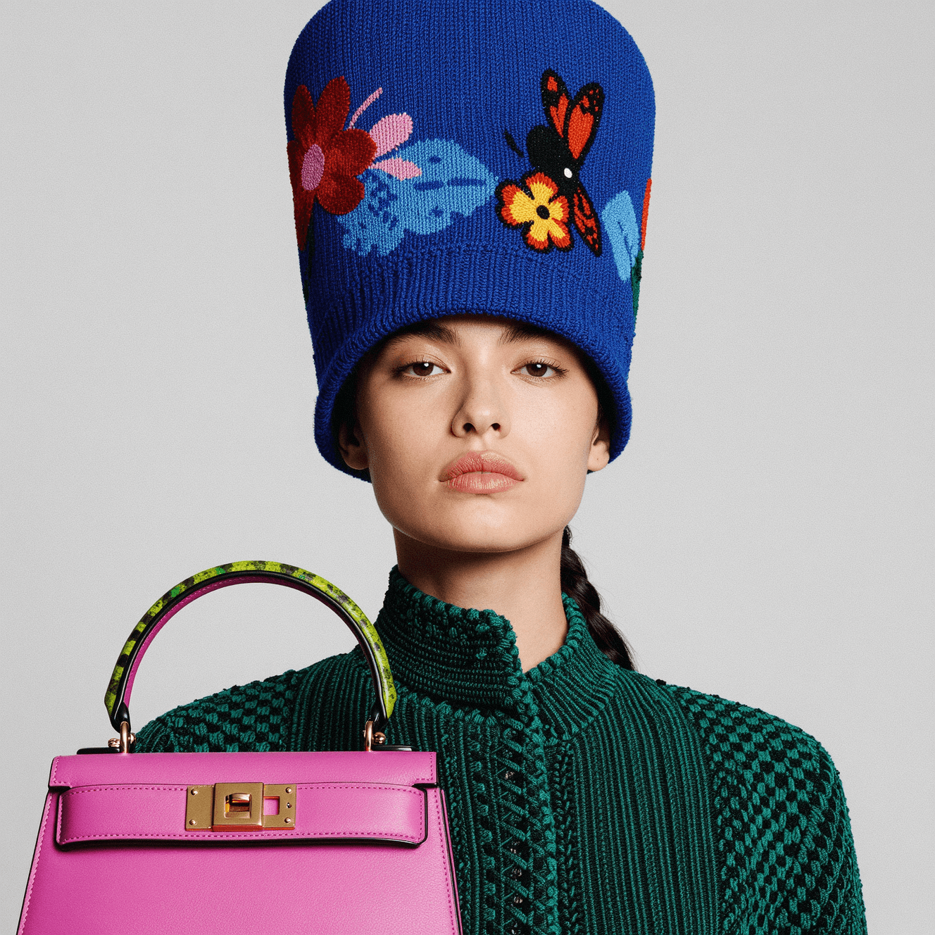 Minimalist brushed-steel chair in a white corner studio—industrial, brutalist modern furniture.