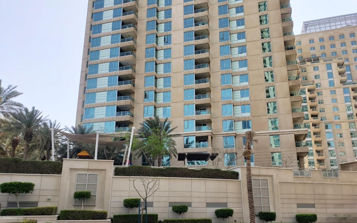 Close-up of residential balconies at Mesk Tower, showcasing modern real estate design.