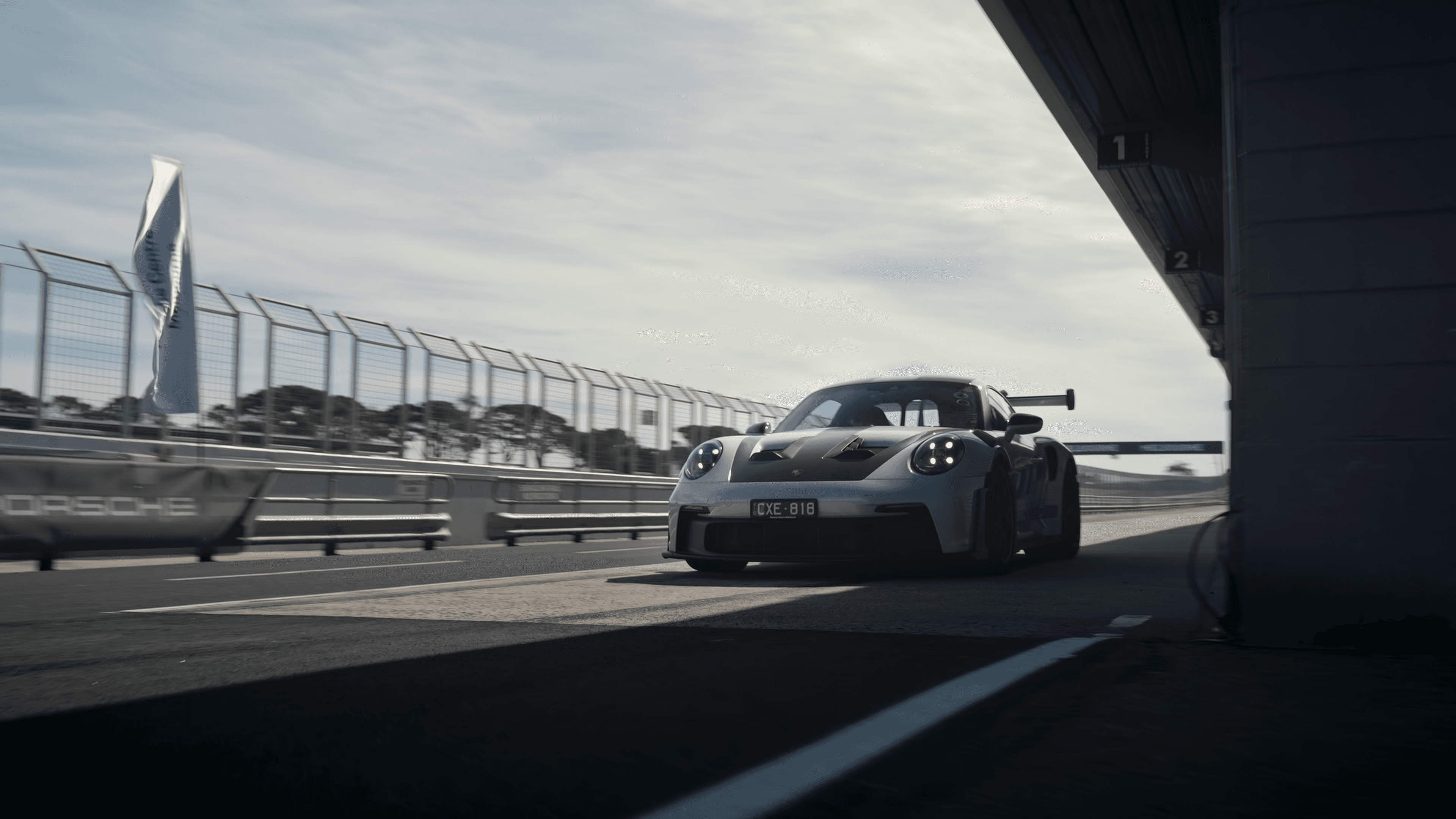 Two models walking side by side, wearing activewear, with a city landscape in the background