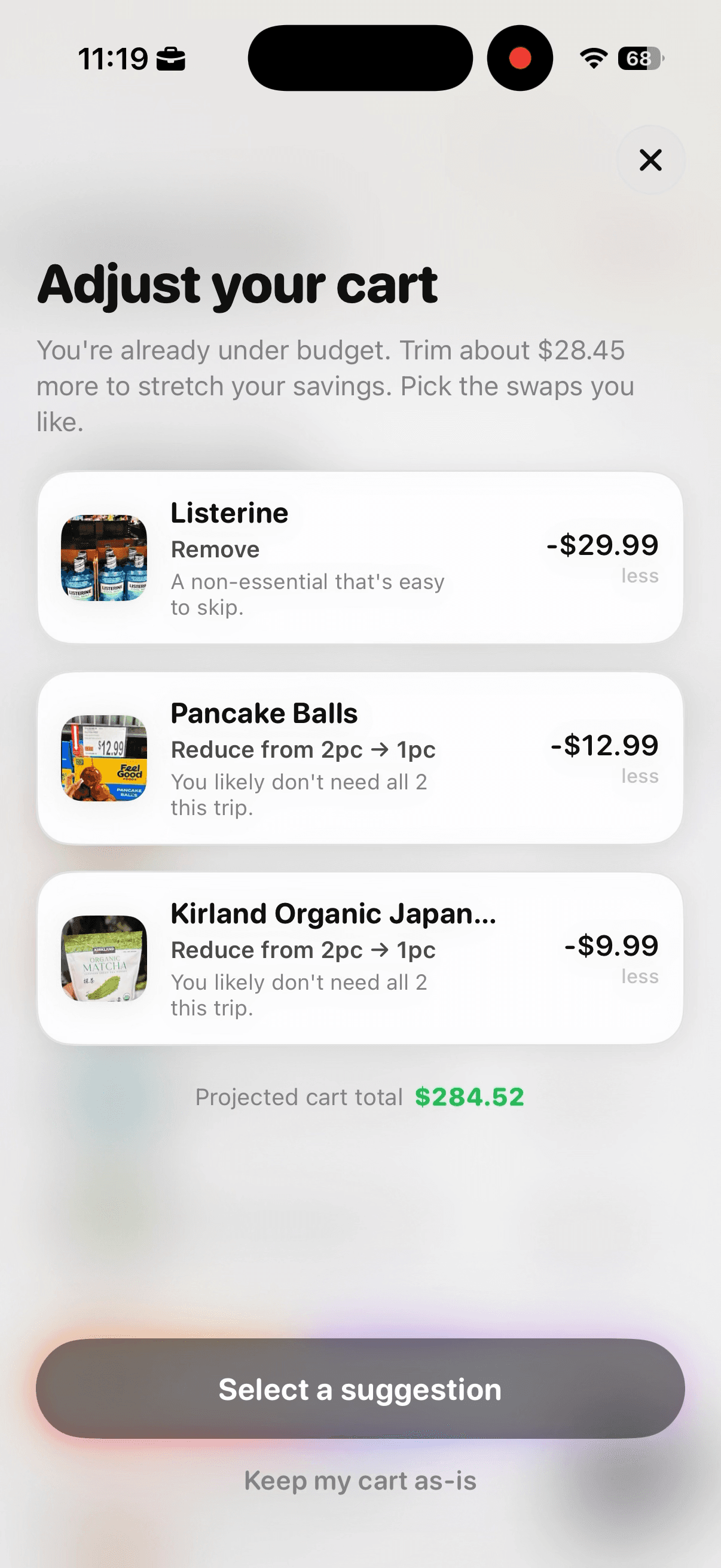 Cart AI Adjust Cart screen showing one removal and two quantity reduction suggestions with projected savings.