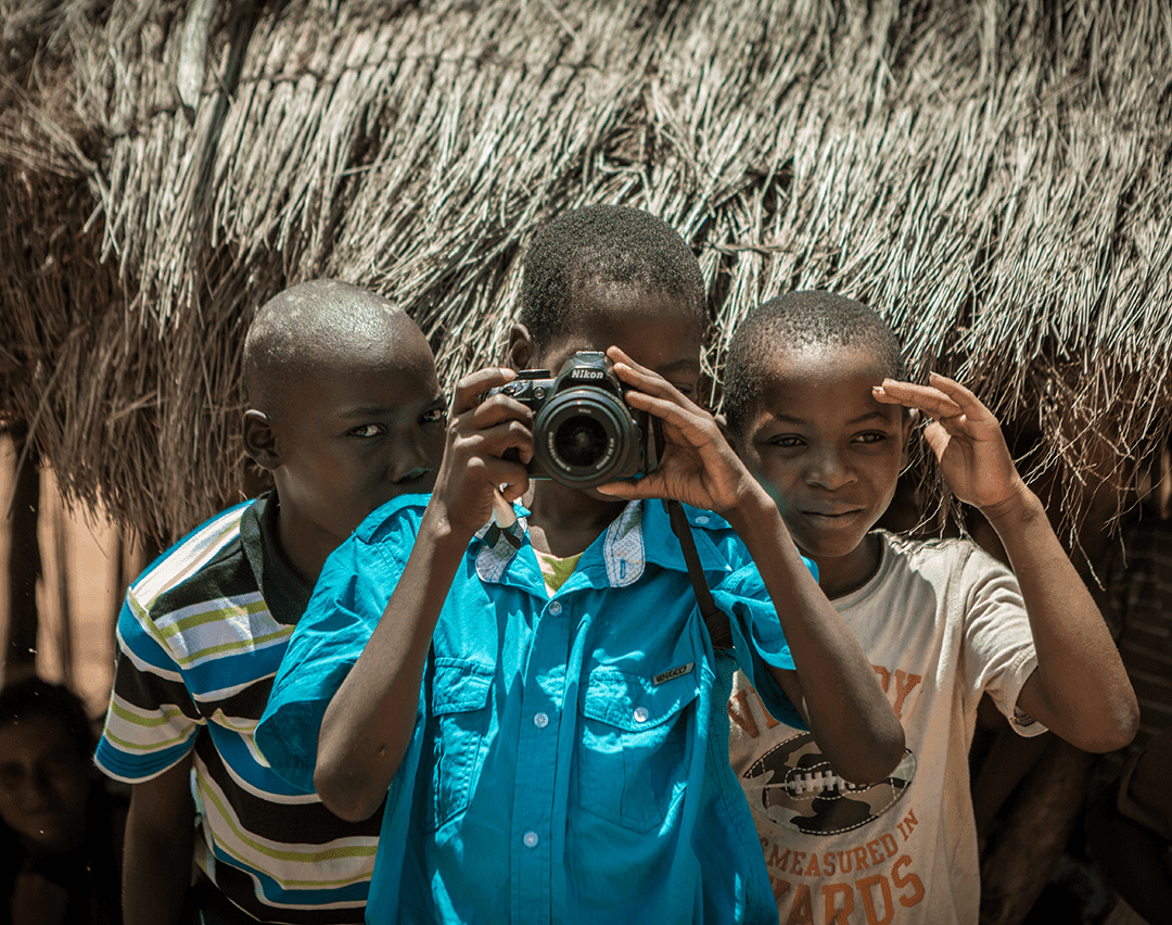 white concrete building near sea under blue sky during daytime