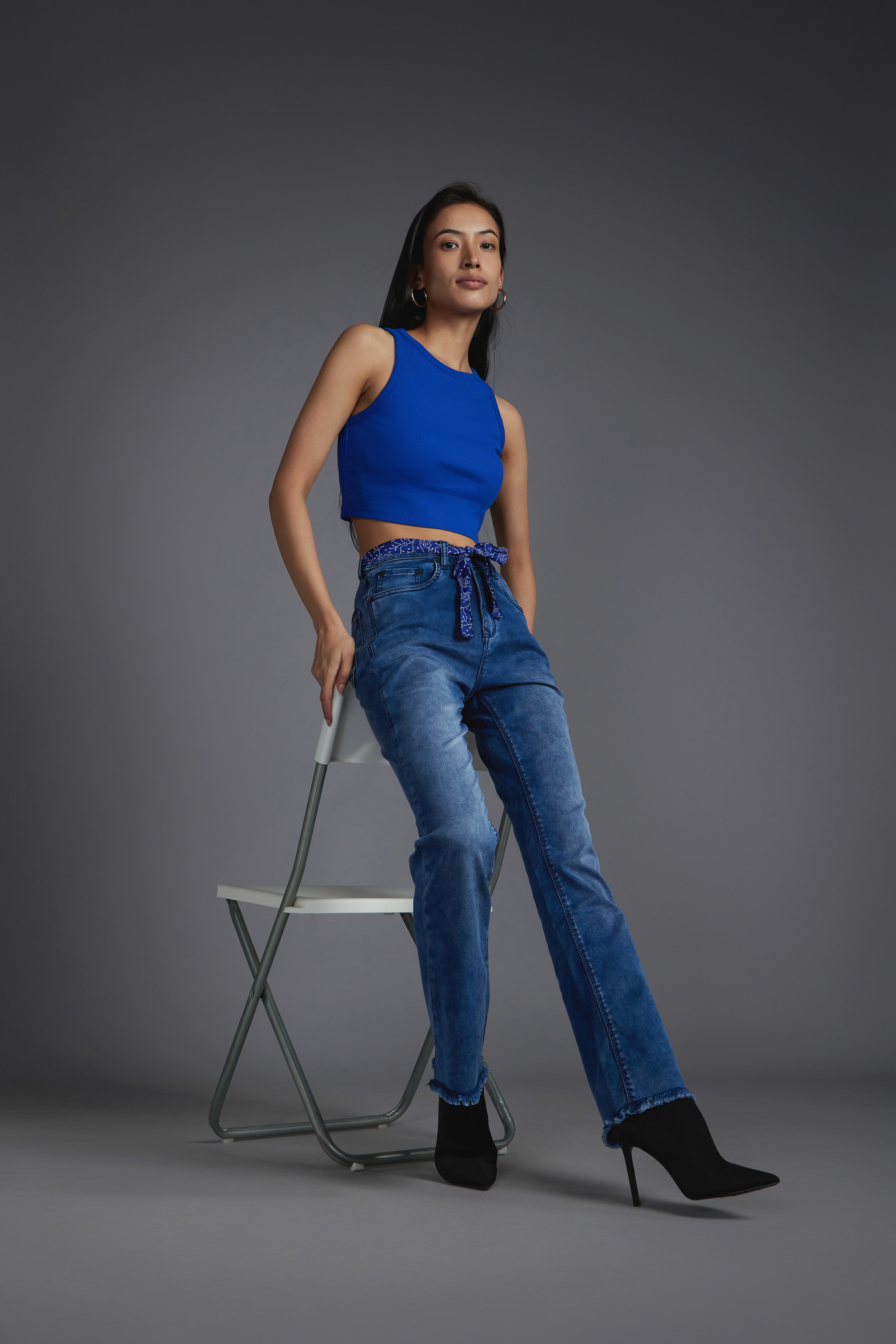 Friends laughing and posing inside a car
