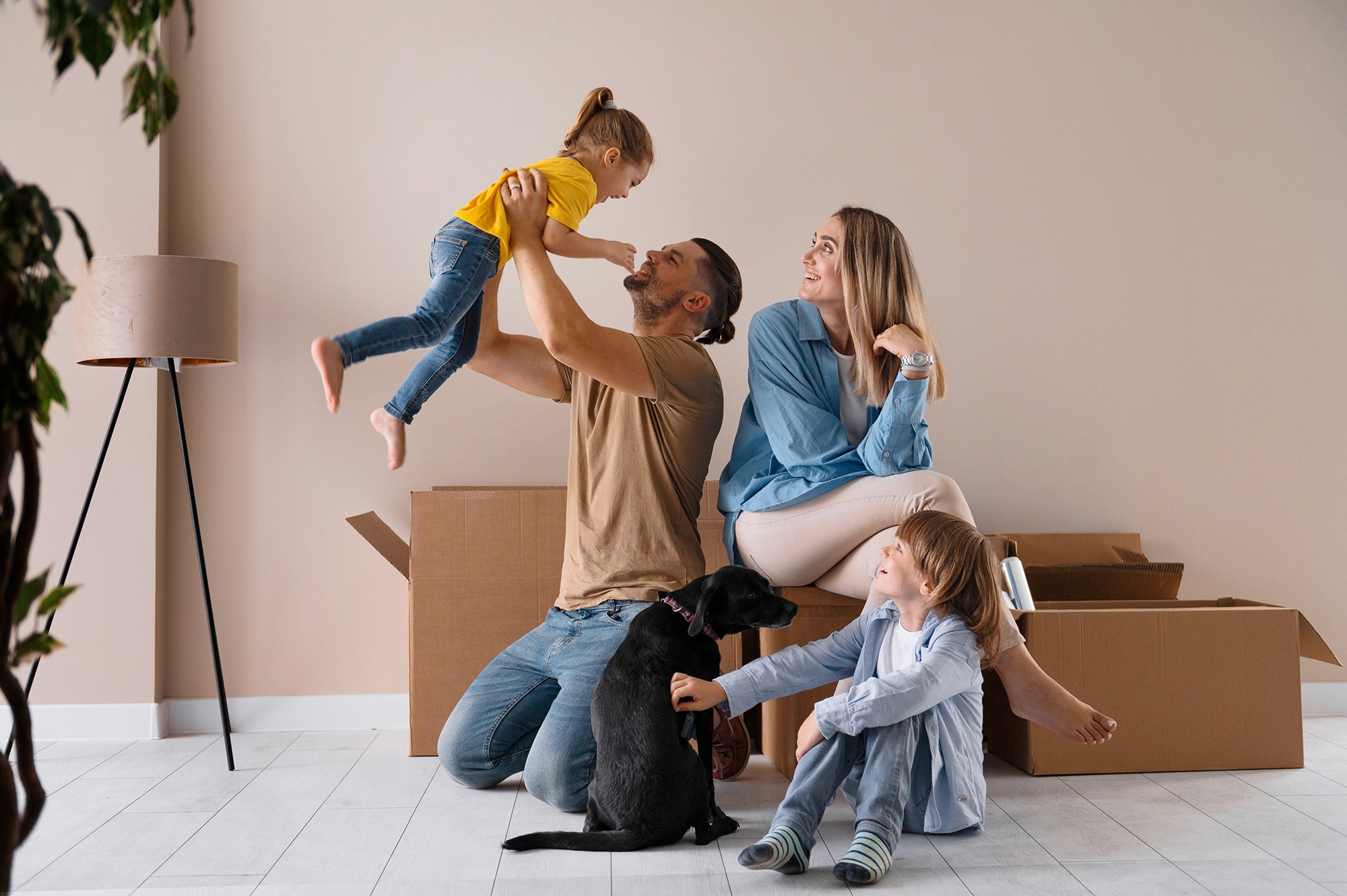 Image of a family moving into a new home