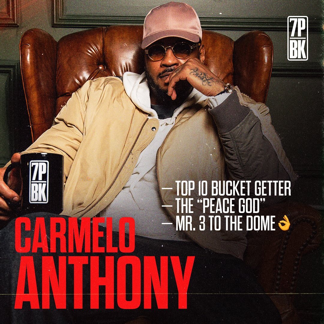 Snow-capped mountains viewed through a car window.