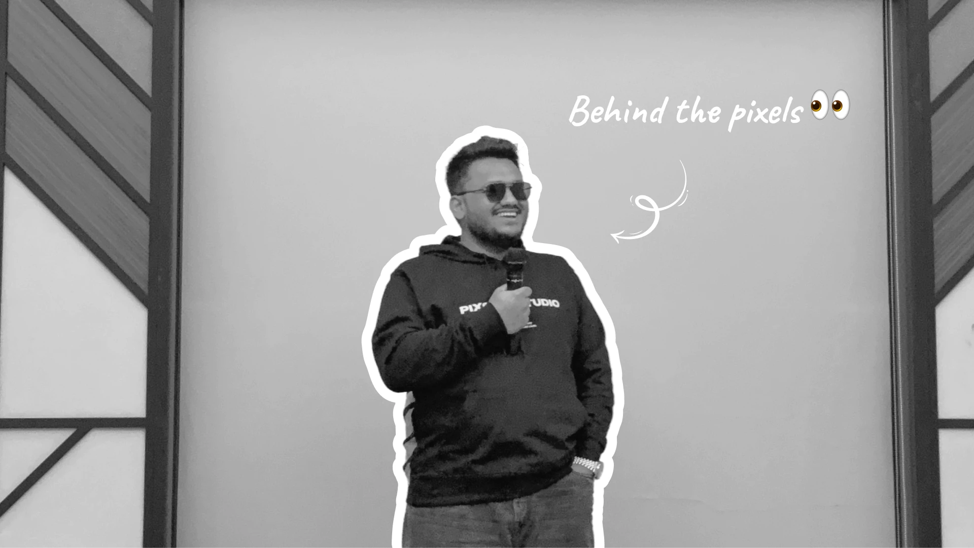 Sujat Sayyed speaking at Pixster Studio during a design event