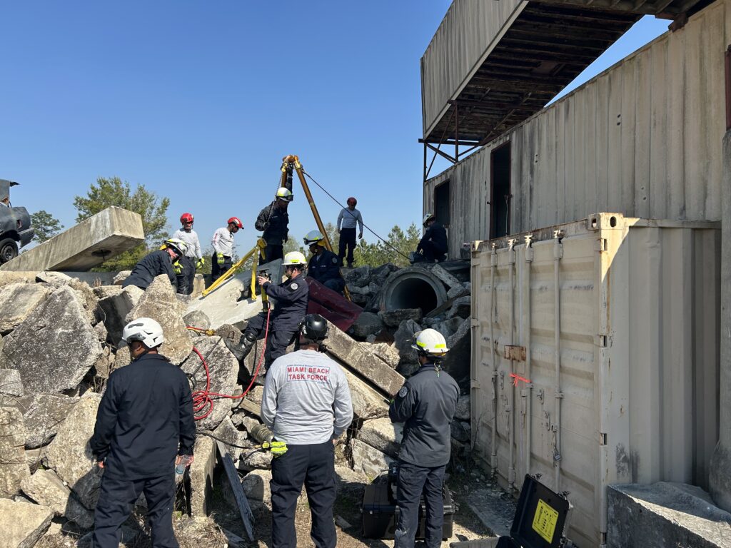 Florida Task Force 1 at Camp Blanding rescuing a victim from underneath a slab.