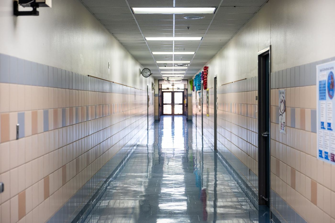 Empty school corridor with a shiny floor