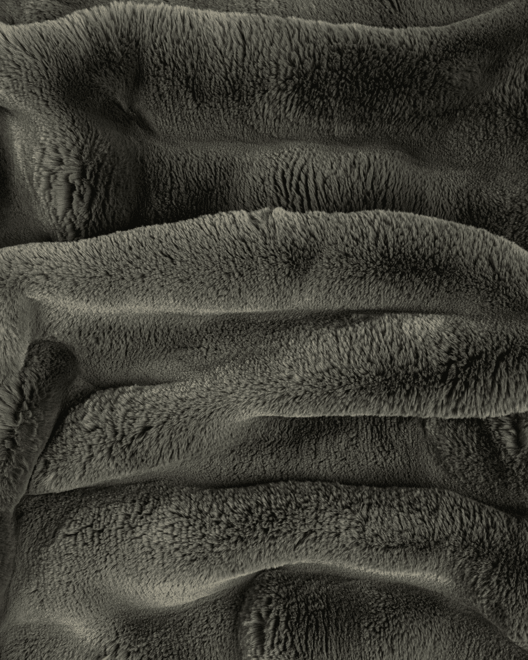 close up fabric shot of a dimensional faux fur blanket in peak