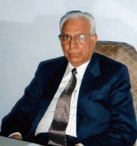 Group of men standing with Sufboard