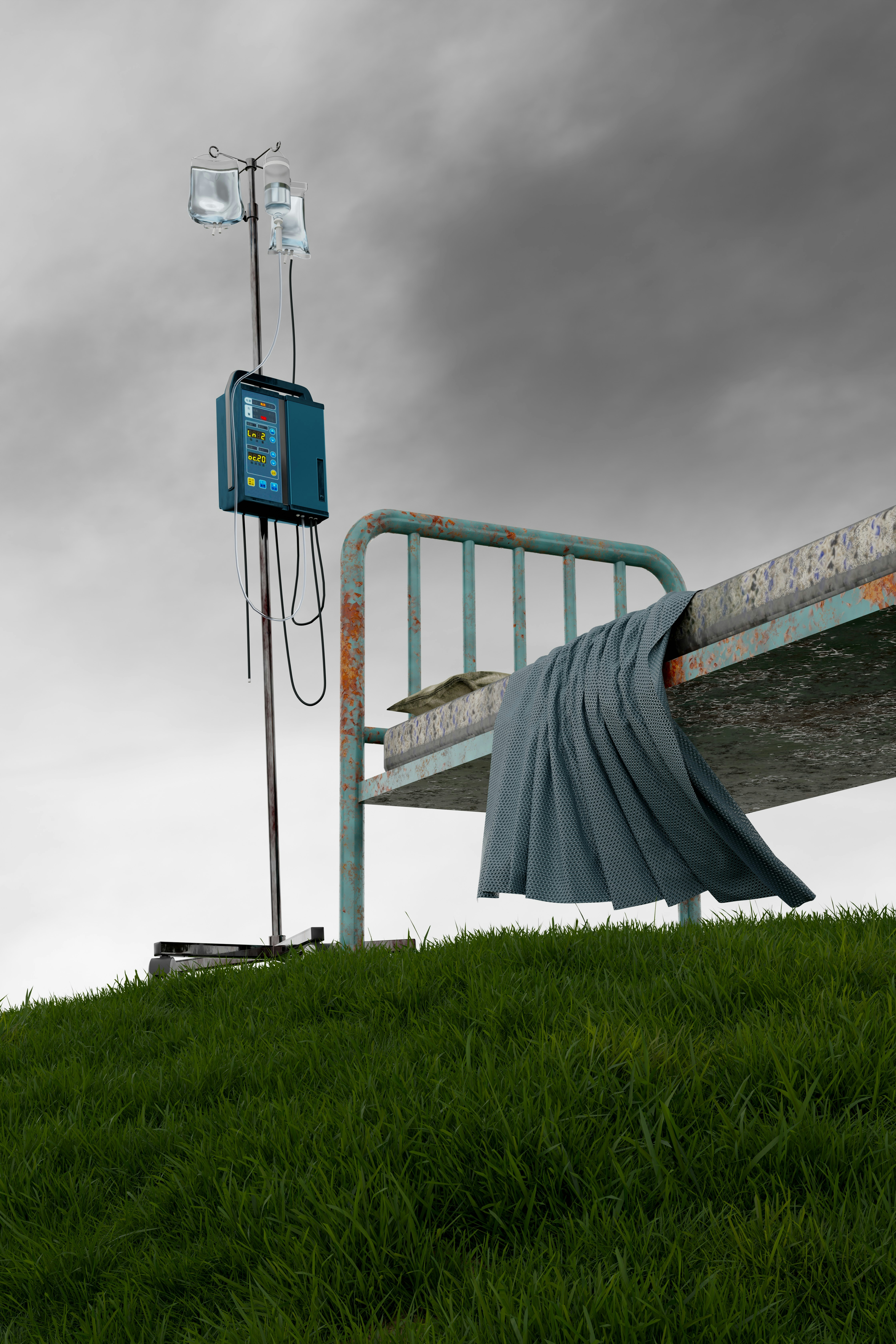 Hospital bed with iv drip on grassy hill