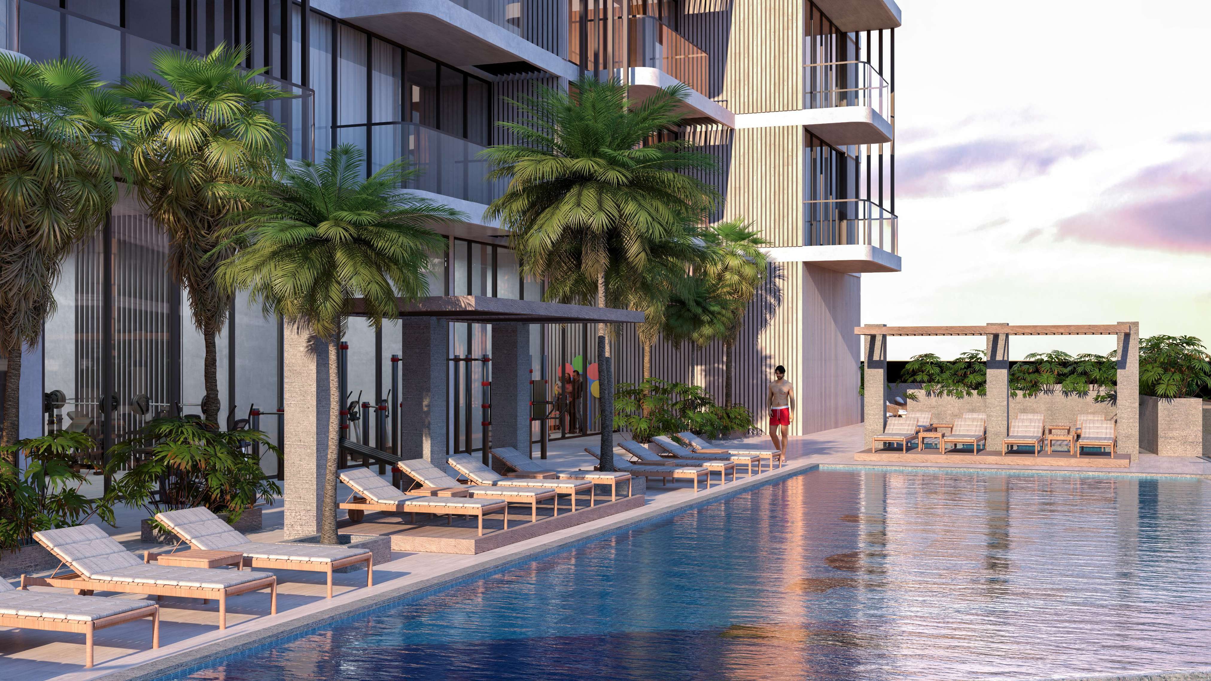 Expansive poolside terrace and gym exterior at Tetr1s Tower, highlighting world-class residential amenities.