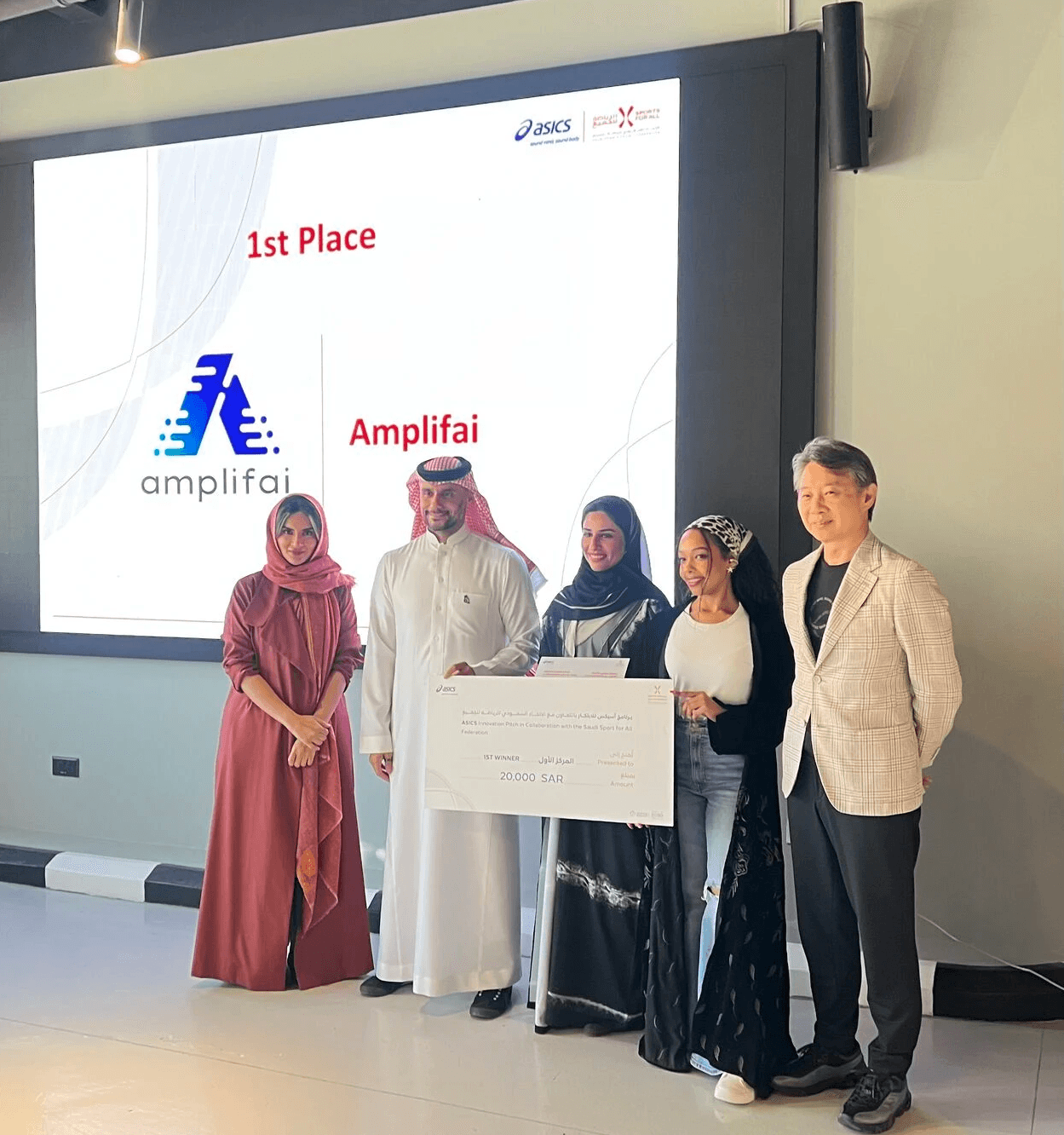 Maissa Almagati and Rania Alawad receiving Amplifai Health’s first-place award at the ASICS Innovation Pitch 2025. The event was attended by H.E. Yasunari Morino, Ambassador of Japan to Saudi Arabia, and H.R.H. Prince Khaled bin Alwaleed bin Talal Al Saud, who was part of the judging panel.