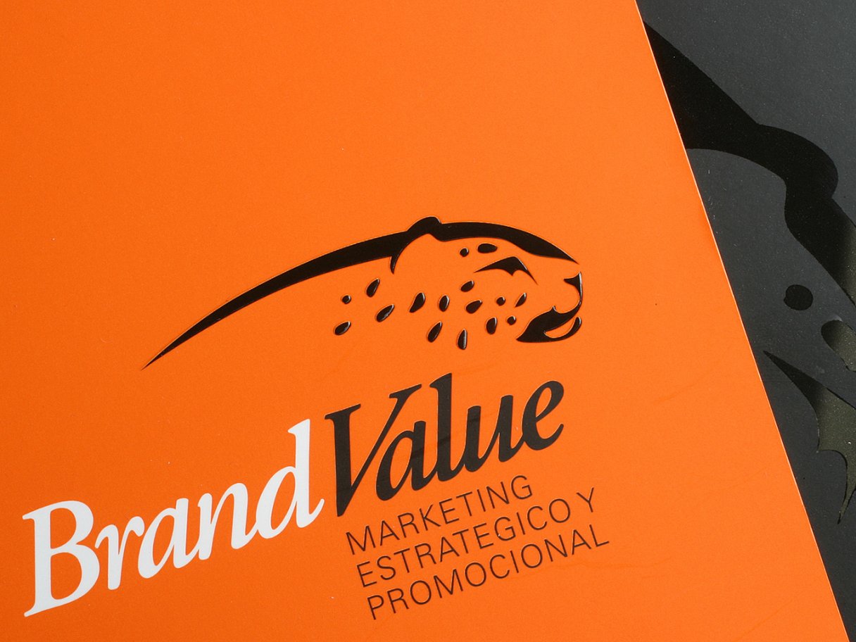 Rustic cabin in a golden field at sunset