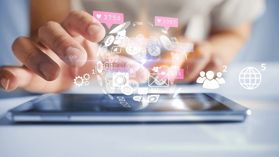 a hand touching a hologram globe on a phone