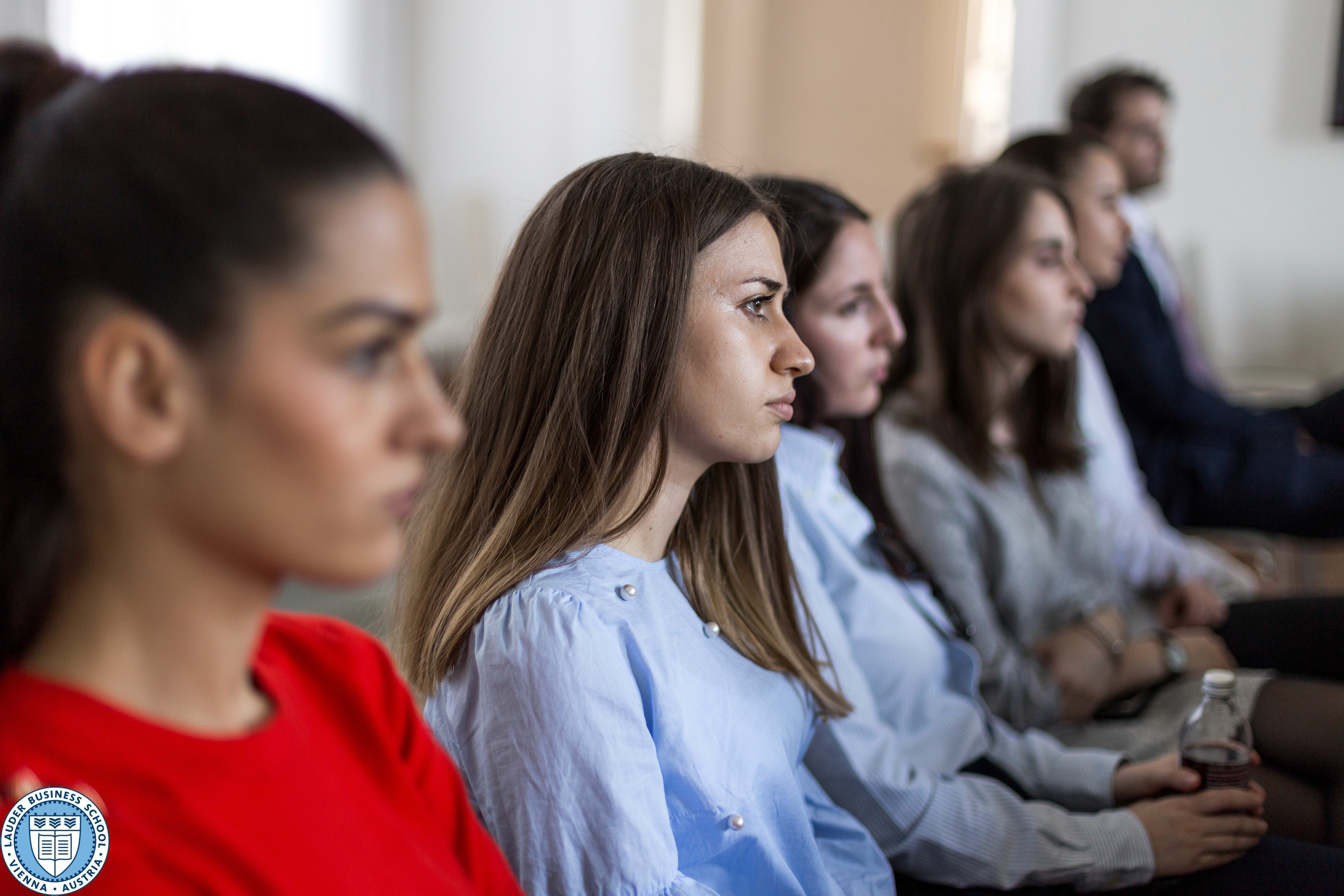 LBS students listneing to Dr. Florian Koschat, the CEO of Pallas Capital Advisory AG 