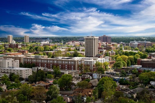 Aerial view of Lexington KY with highways and neighborhoods, ideal for roll-off dumpster rentals