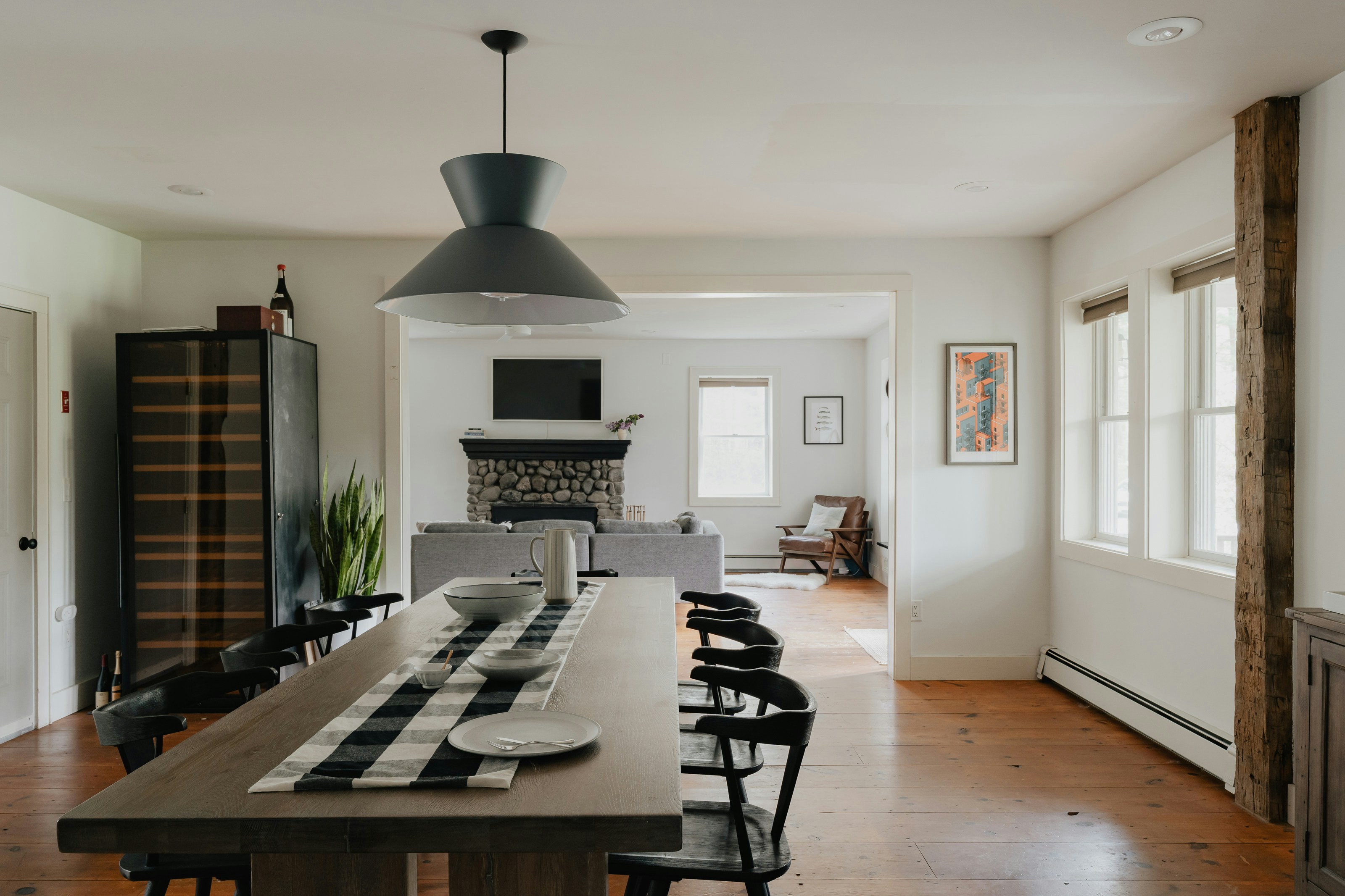 Open-plan kitchen and dining area with sleek design.