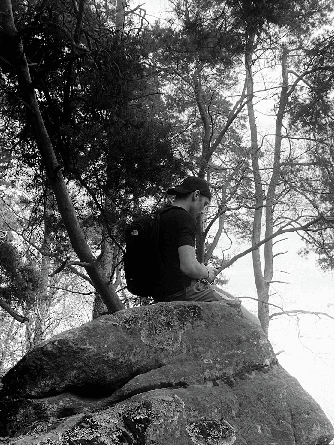 a blurry photo of a person standing in front of a wall