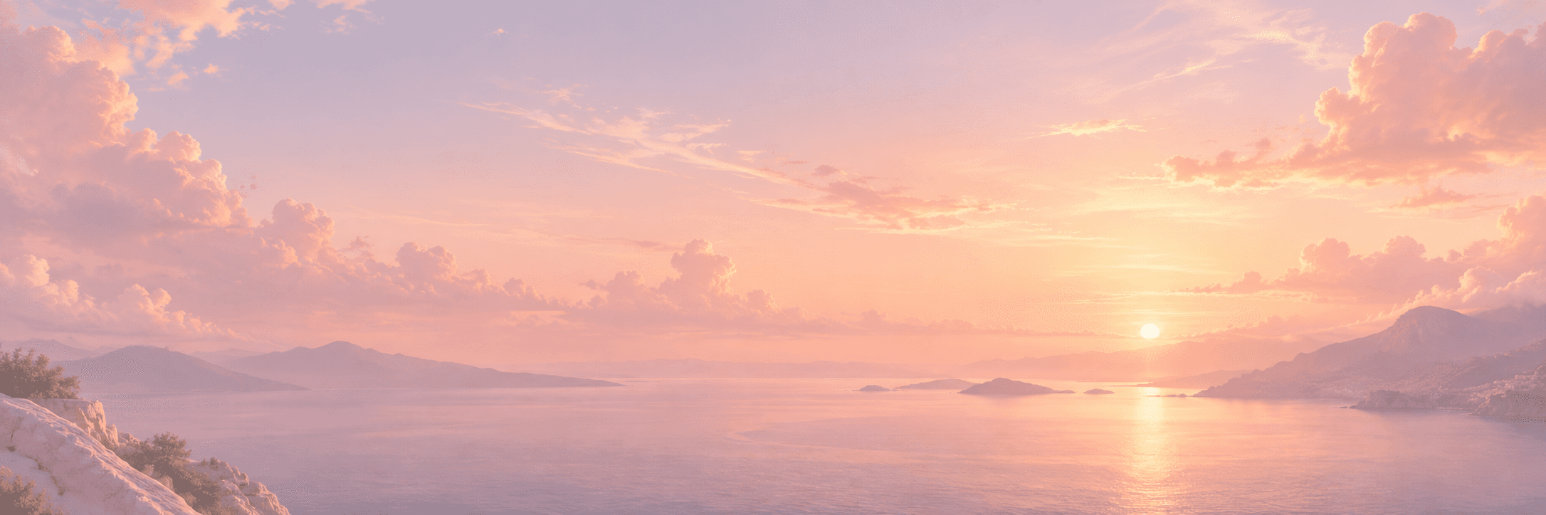 Vast soft yellow field with distant mountains under a bright blue sky, creating a serene and open landscape.