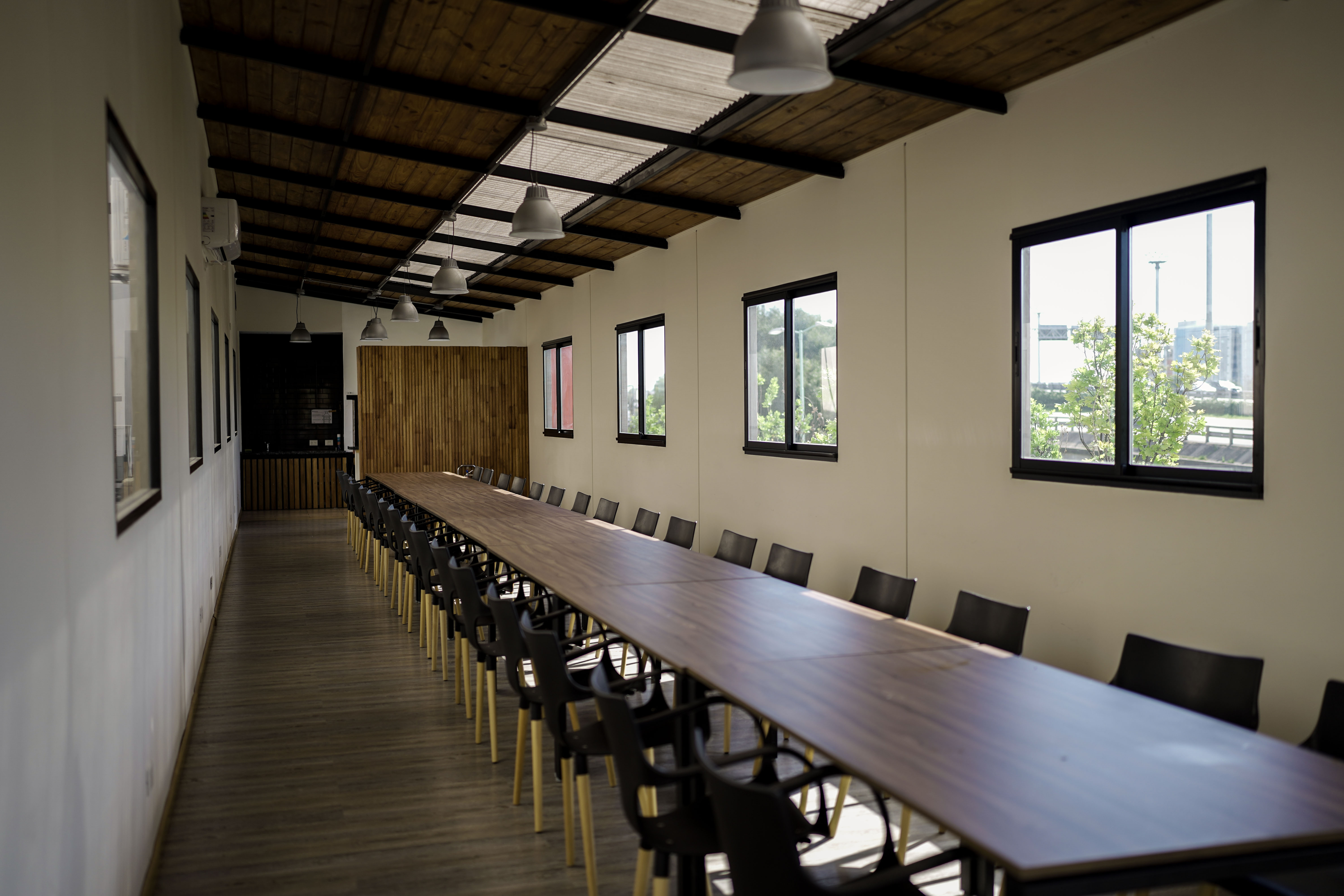 people sitting on chair near glass window during daytime