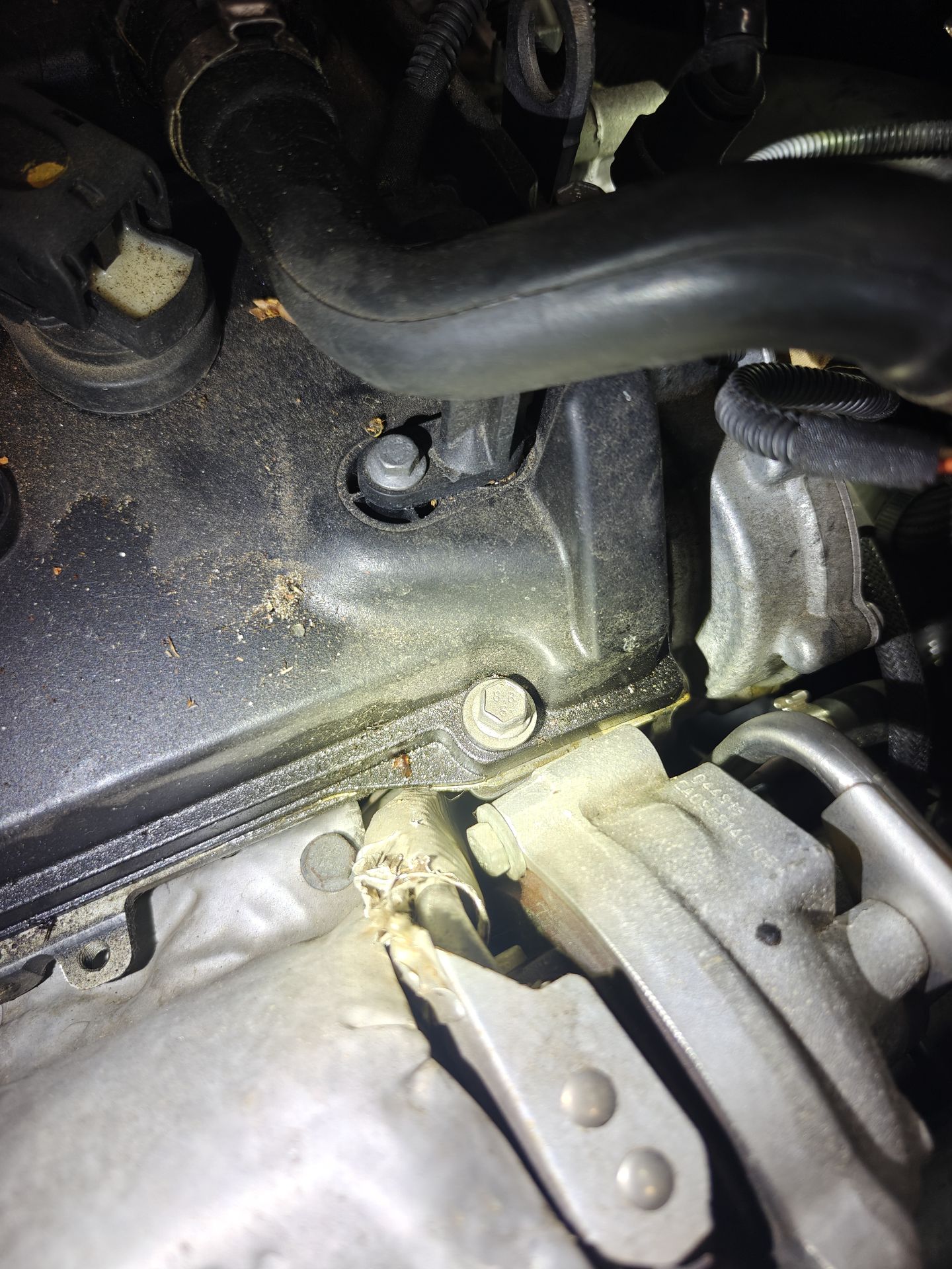 Oil seeping from the edge of the valve cover on the MINI’s 1.6L engine