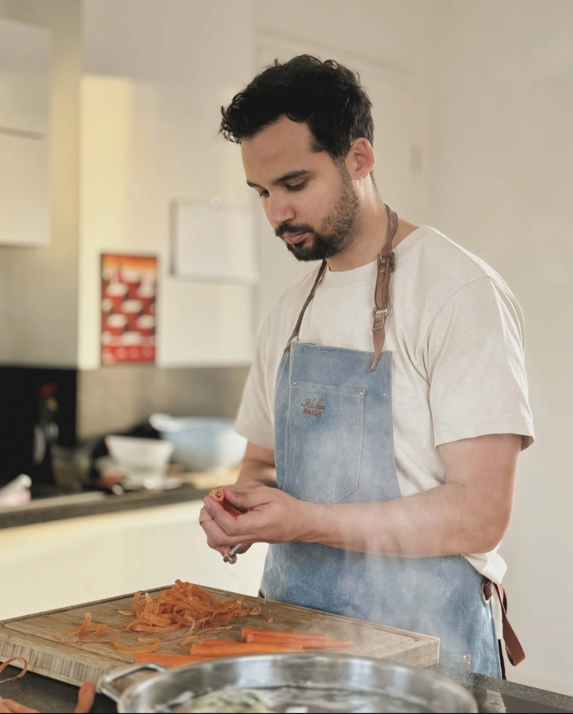 woman in white robe holding chopsticks