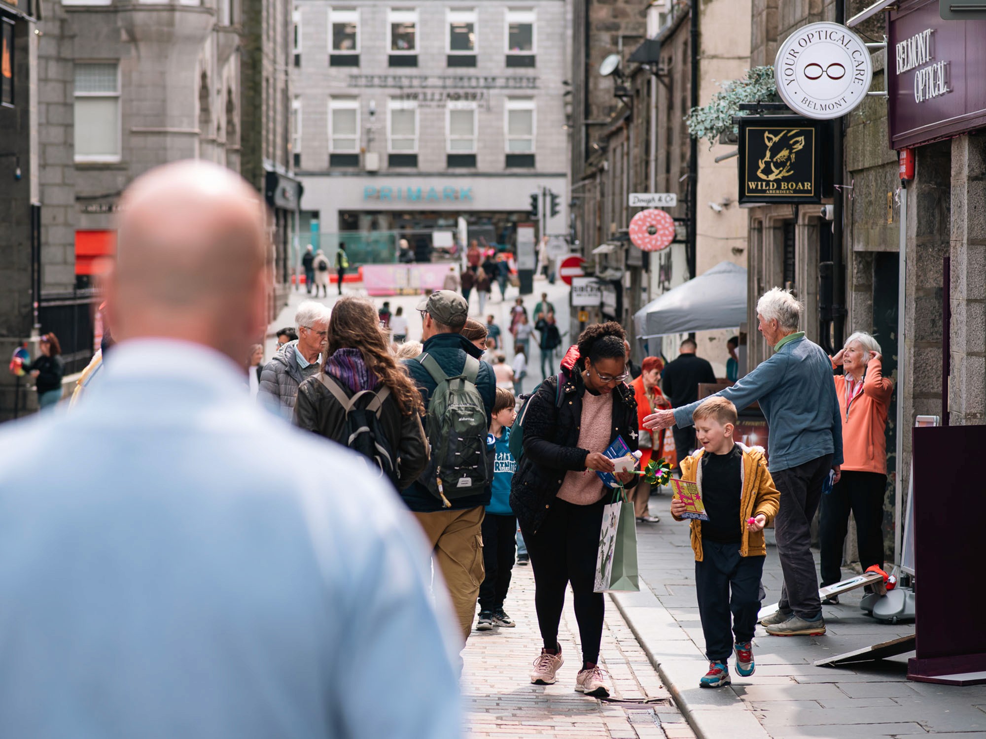 image of a busy street during a festival