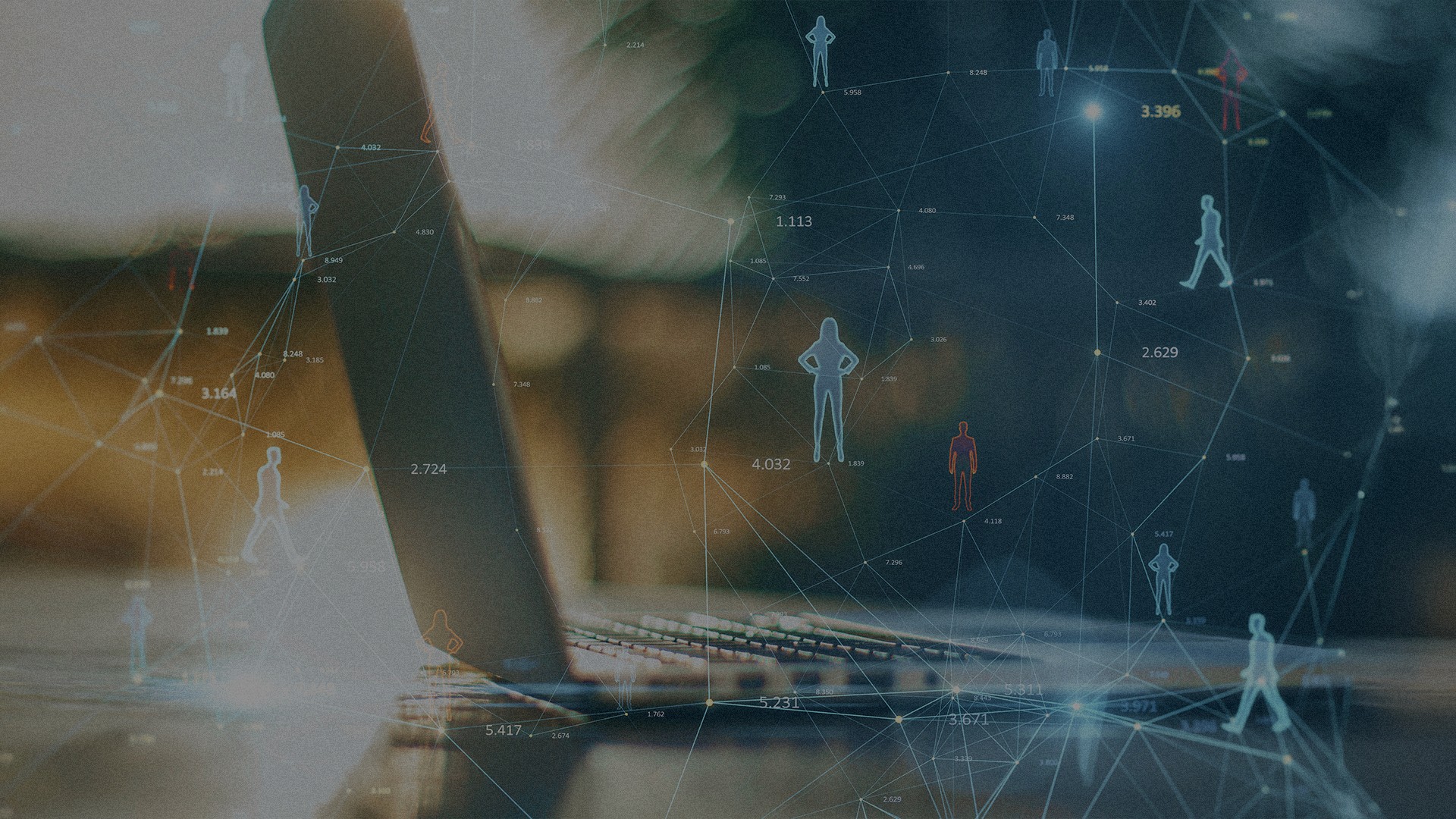 Laptop with connected digital human icons representing AI-driven workplaces, employee collaboration and HR transformation.