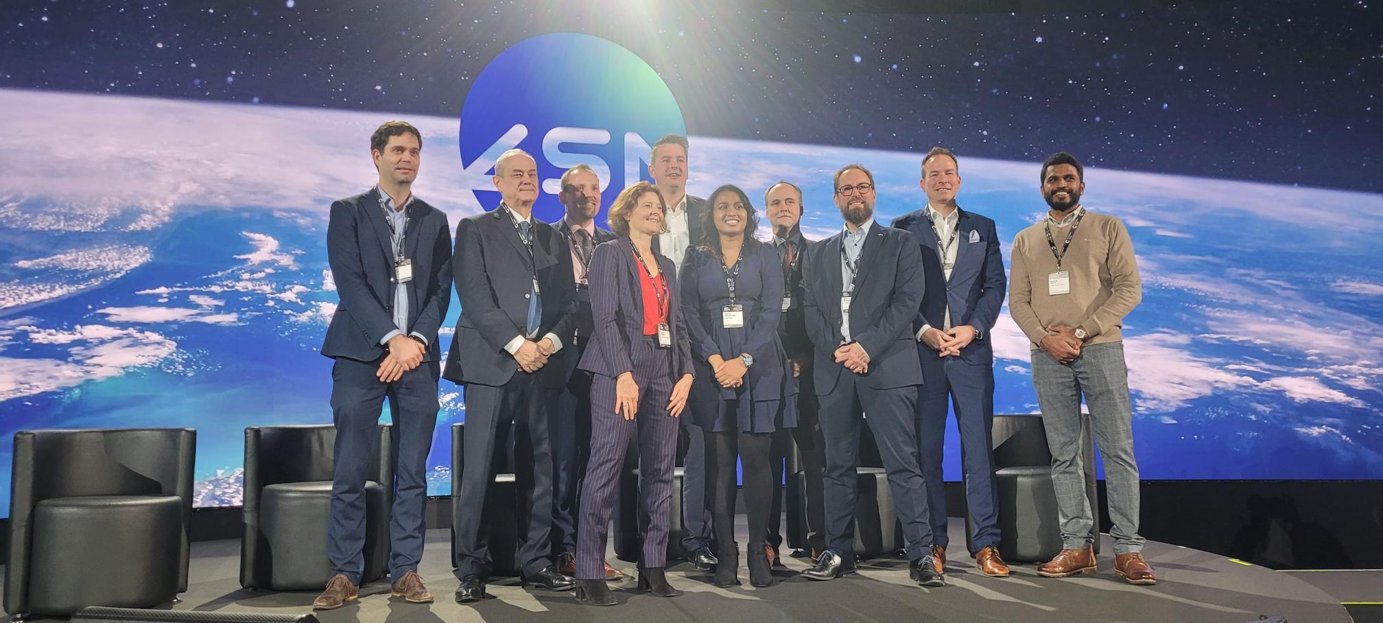 Group photo at a space conference.
