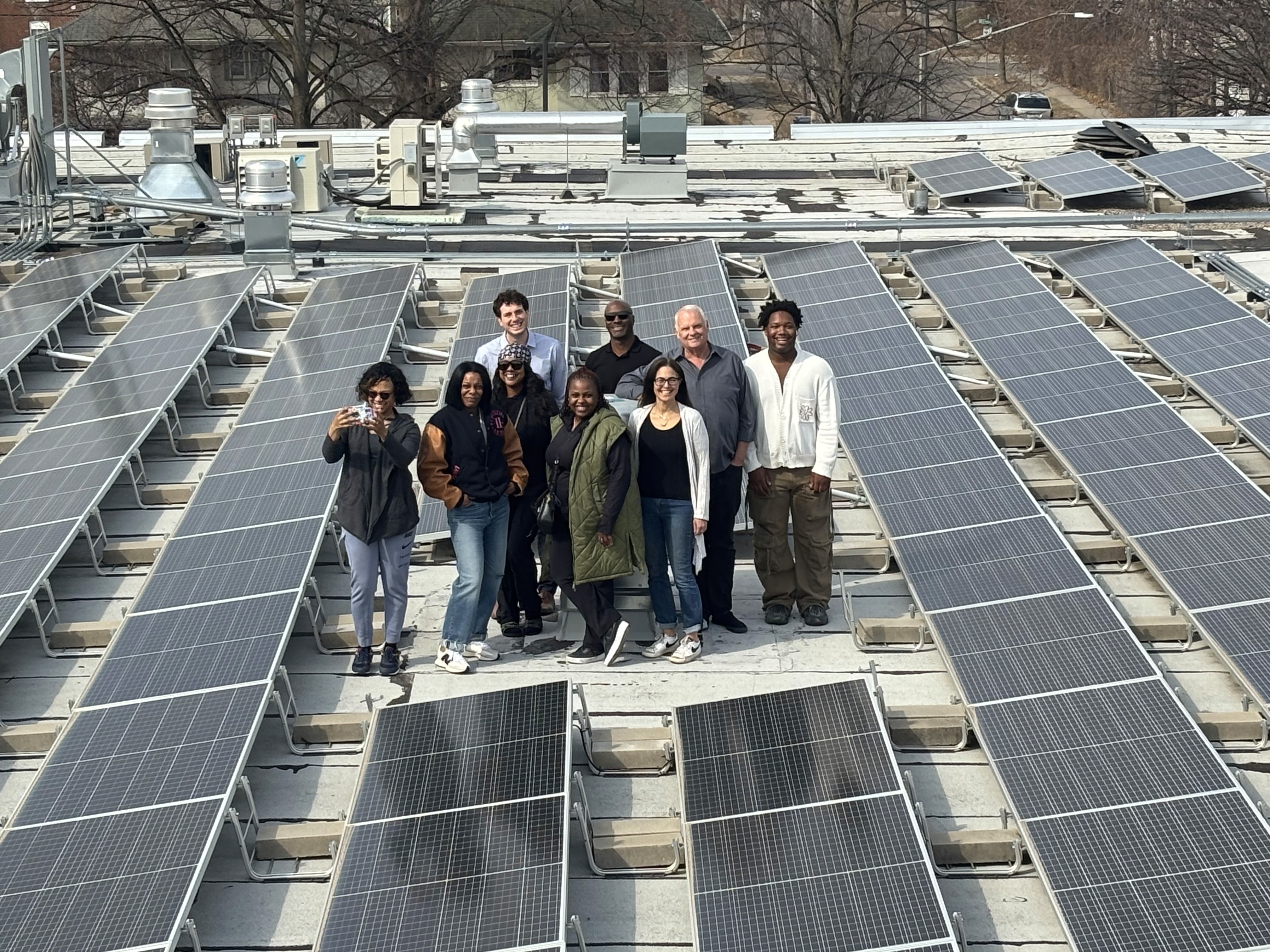 Worker installing solar panels