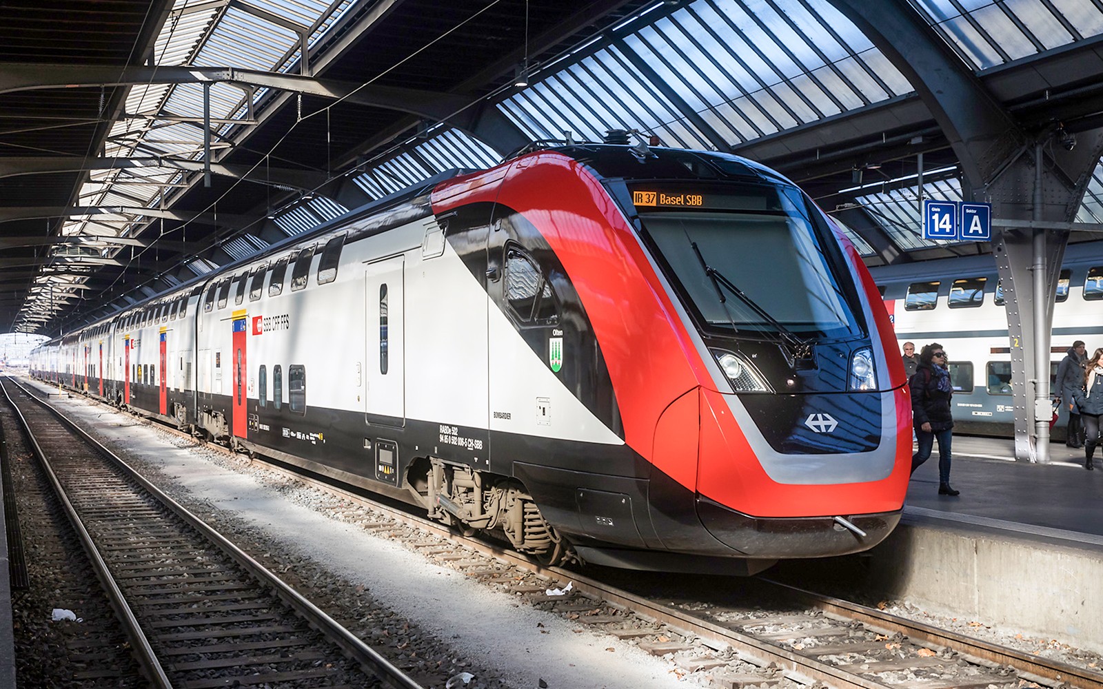 Train at Zurich station platform for one-way trip to Zurich Central.