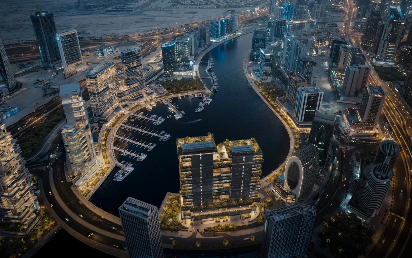 "Enara by Omniyat," a beachfront apartment complex, set against a picturesque sunset, creating a tranquil coastal atmosphere.