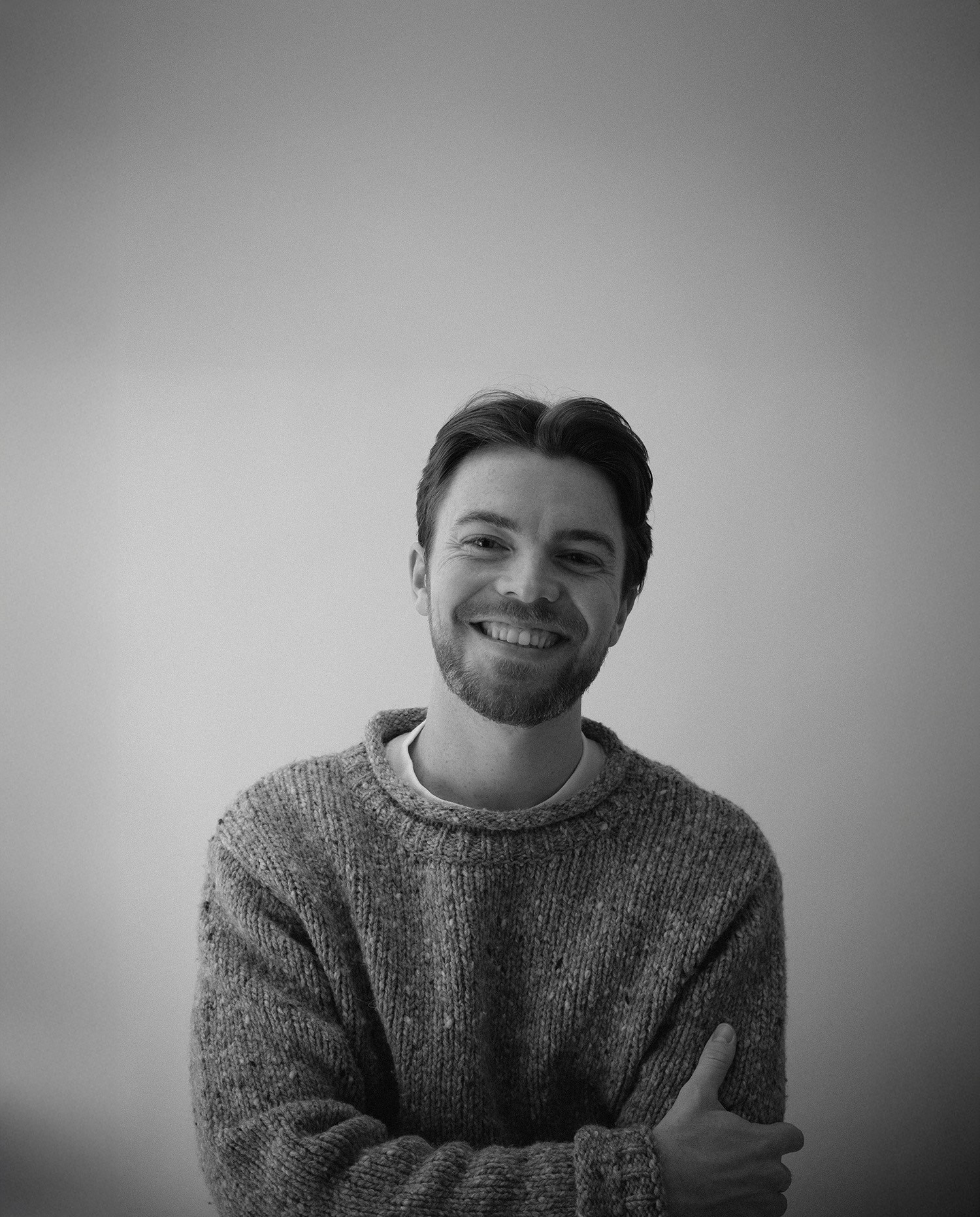 A black and white headshot photo of Sean Peabody.