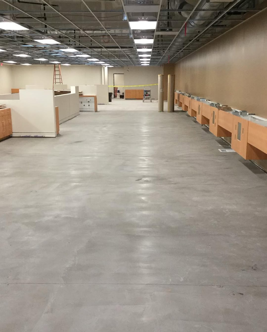 Long view of a prepped slab running the length of a facility