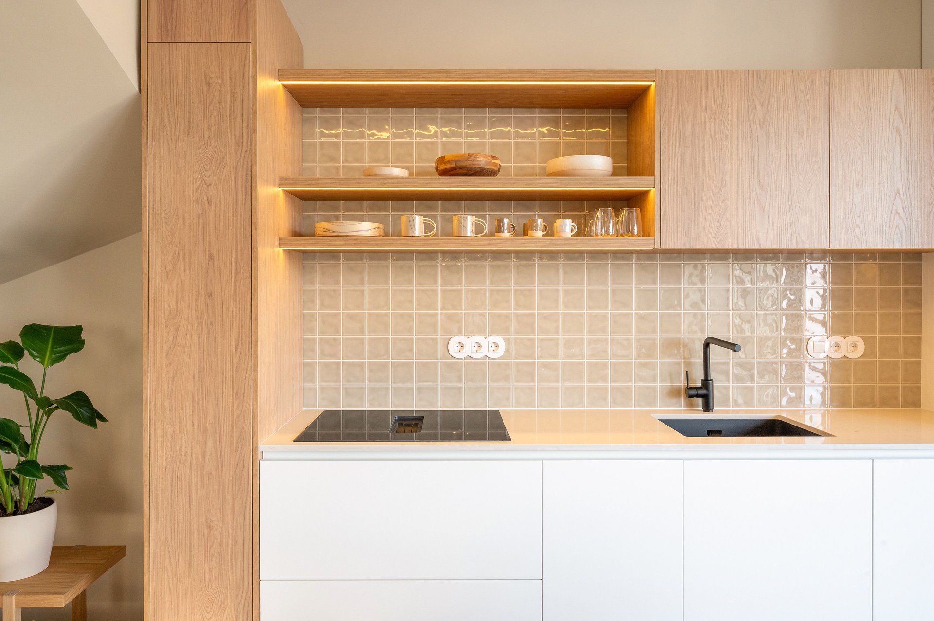 Kitchen detail with wooden shelves at Villa Flora