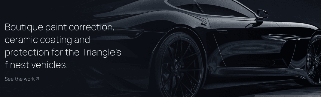 Clipped screenshot of hero image featuring a dark colored sportscar in the backgound and text overlaying the car on the left.