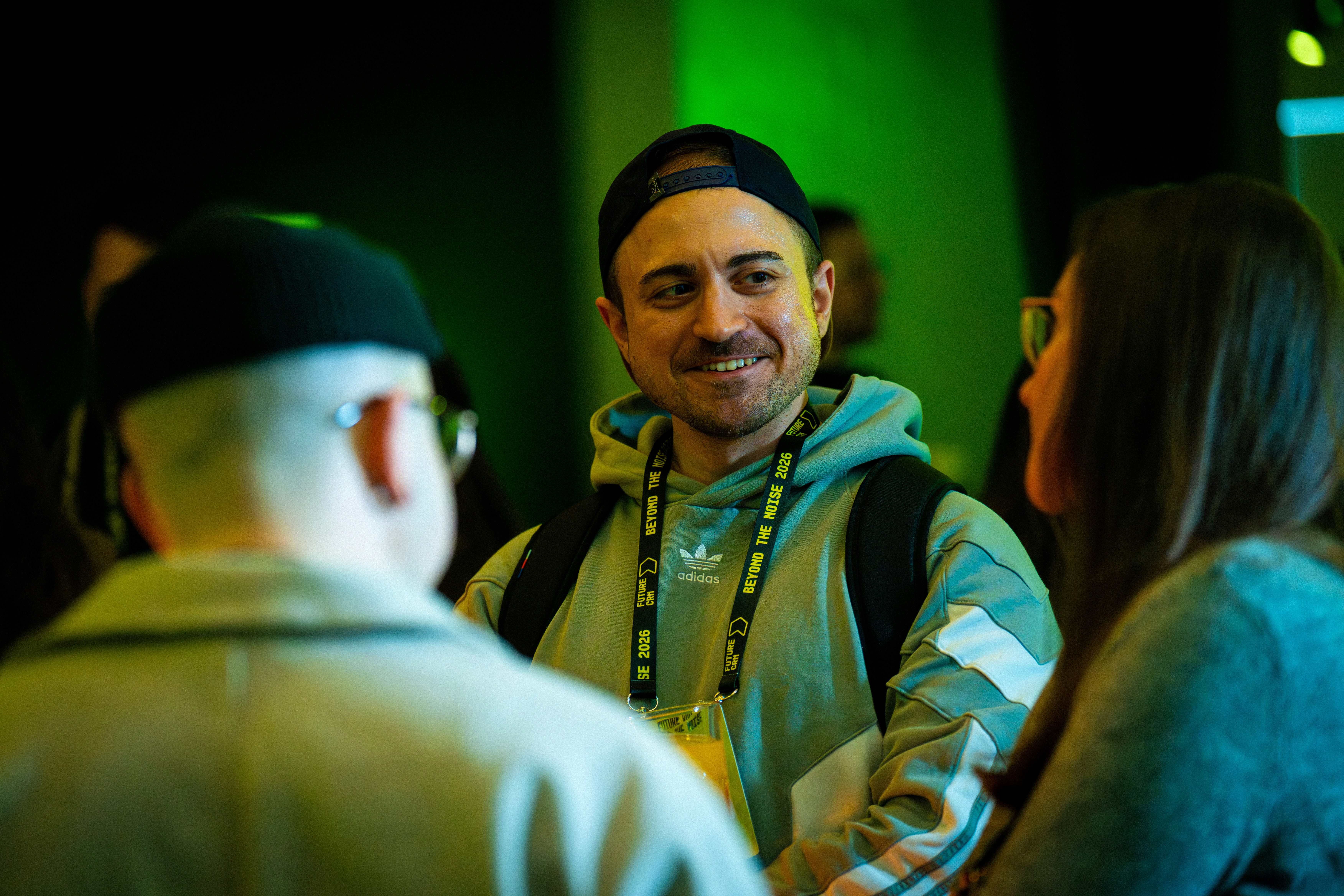 Guy smiling in a group