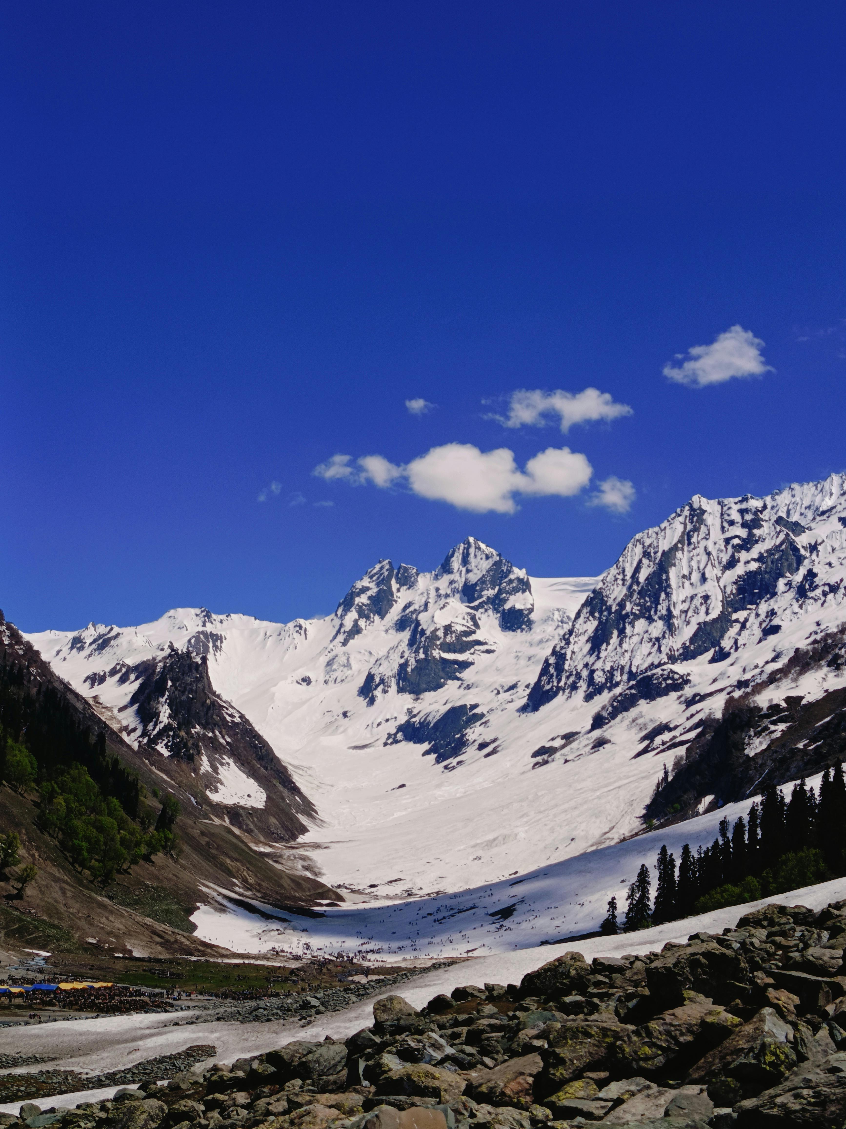 Man photographing granite cliffs in yosemite national park