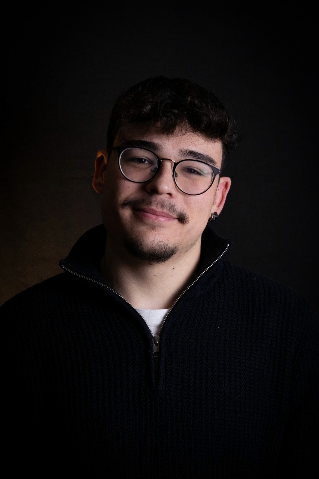 a man smiling for the camera