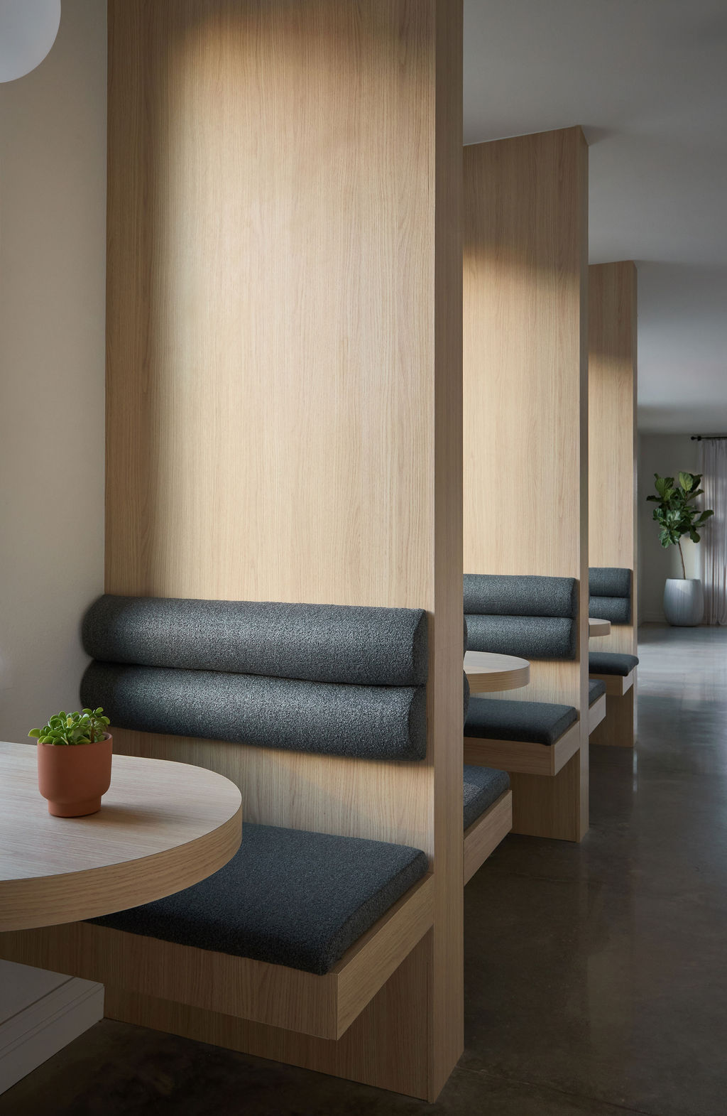 Balcony with table, chairs and greenery
