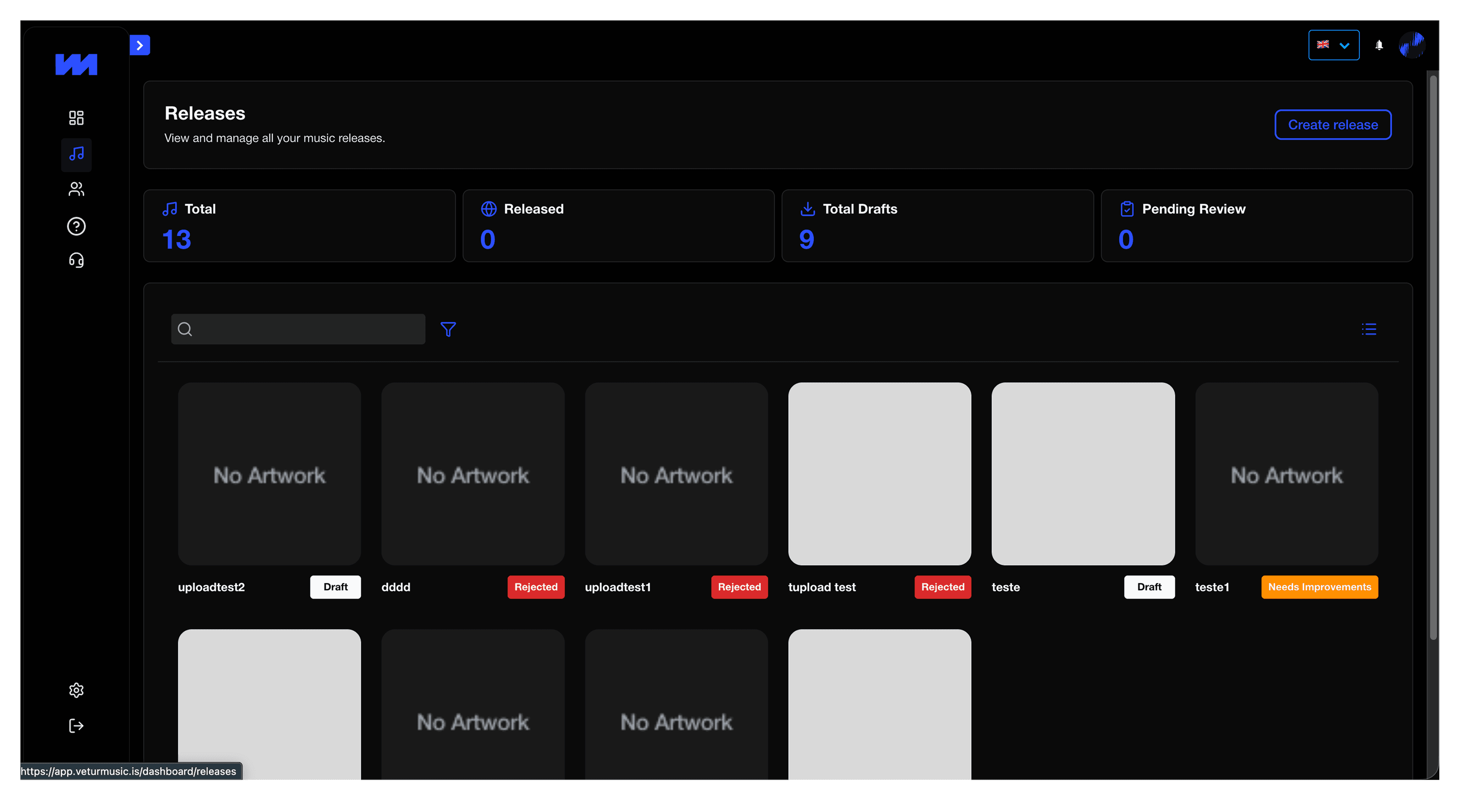 A large orange truck driving down a dirt road