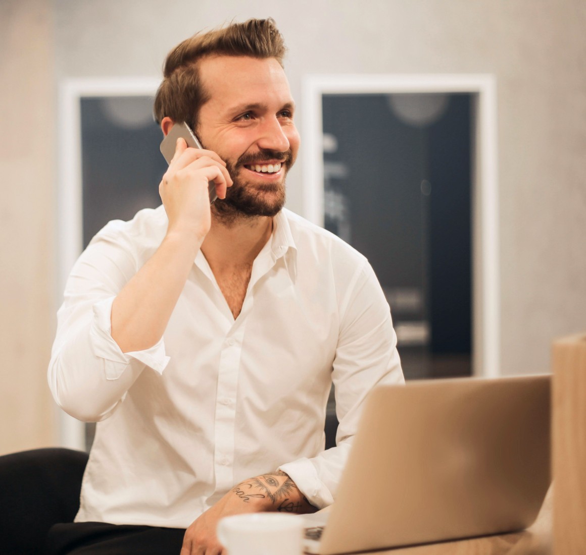 happy business owner with all in one enterprise pos across venues