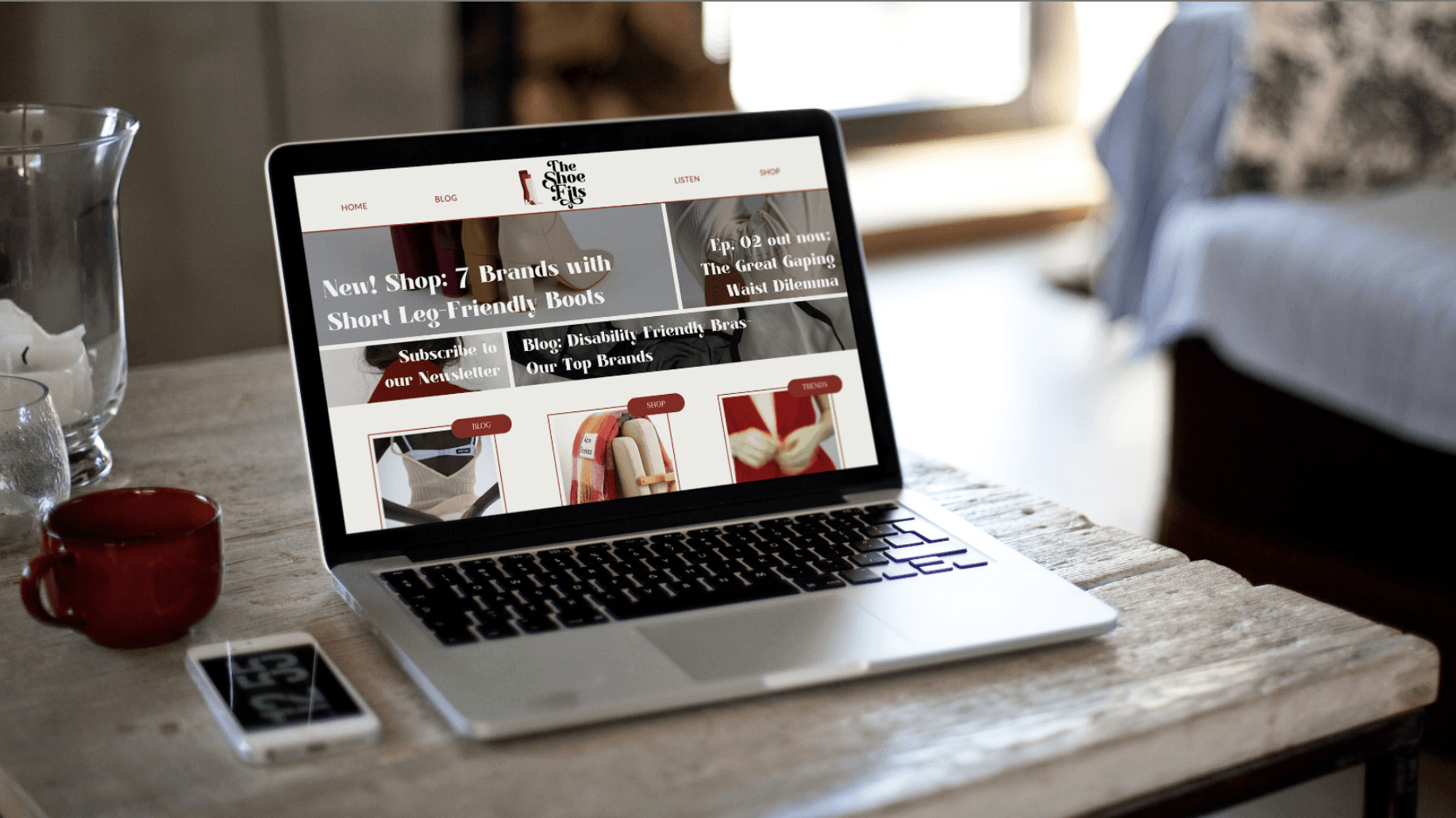 a cell phone leaning on a ledge