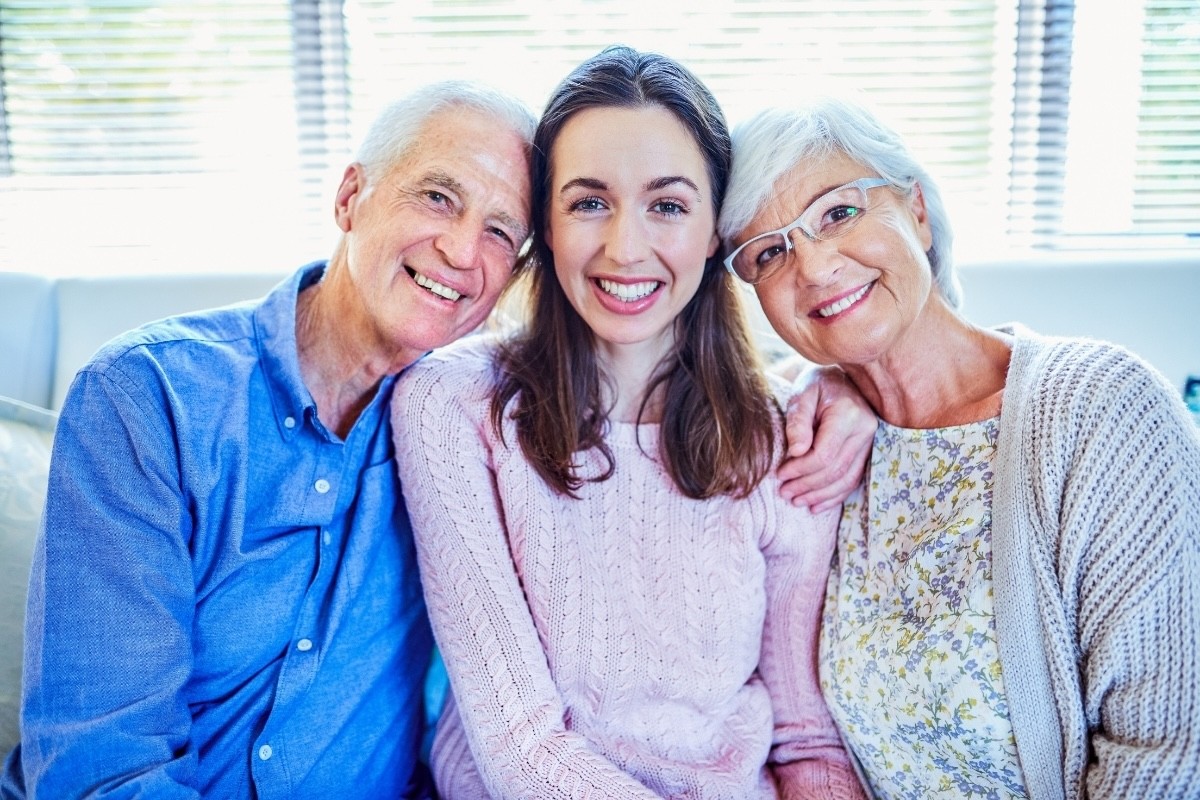 Adult daughter visitin with adults parents.