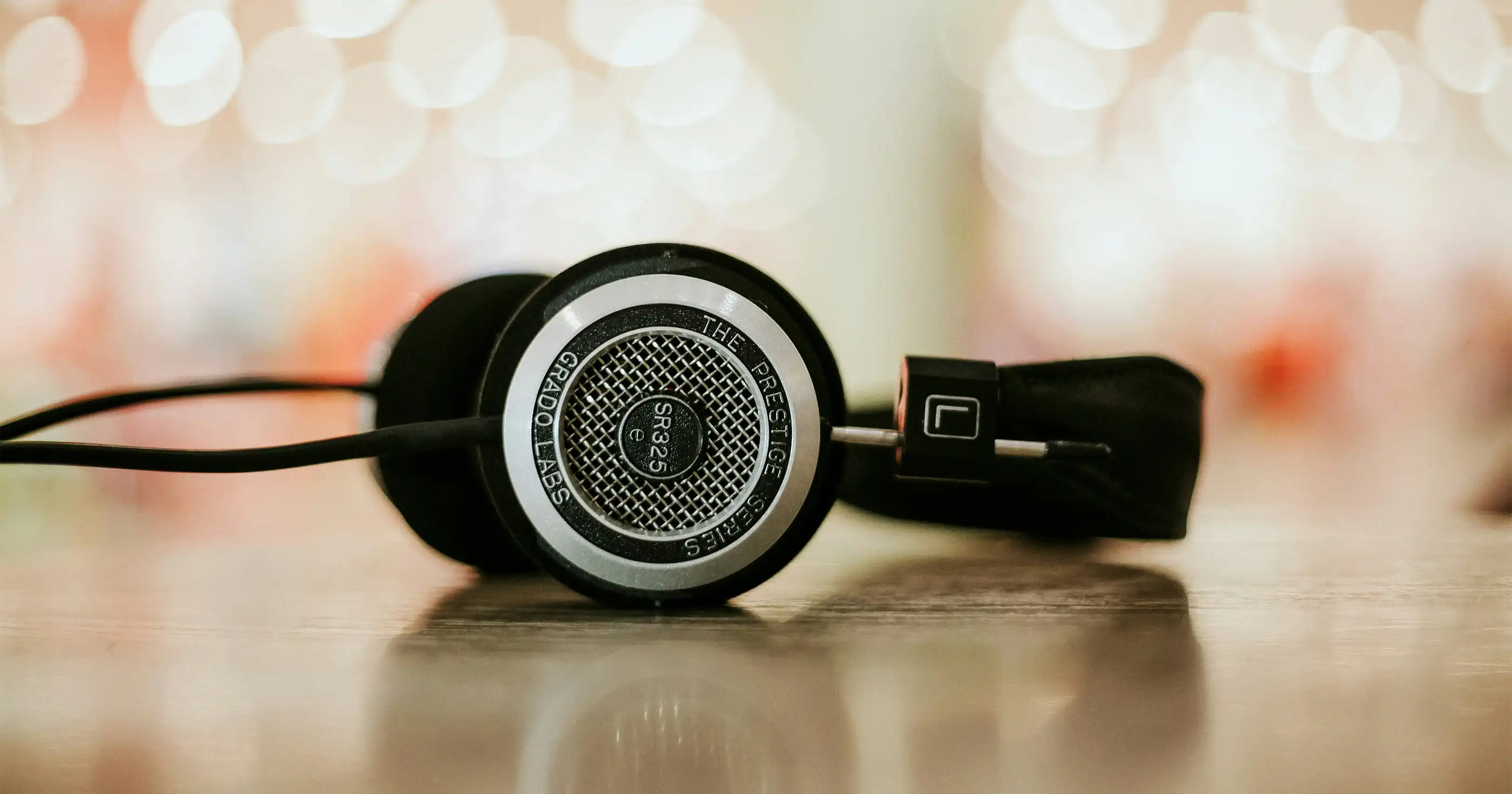 headphones lying on a reflective table