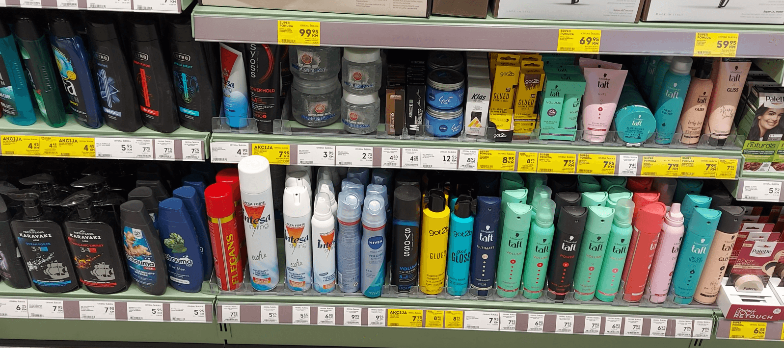 a bottle of red wine with a black background