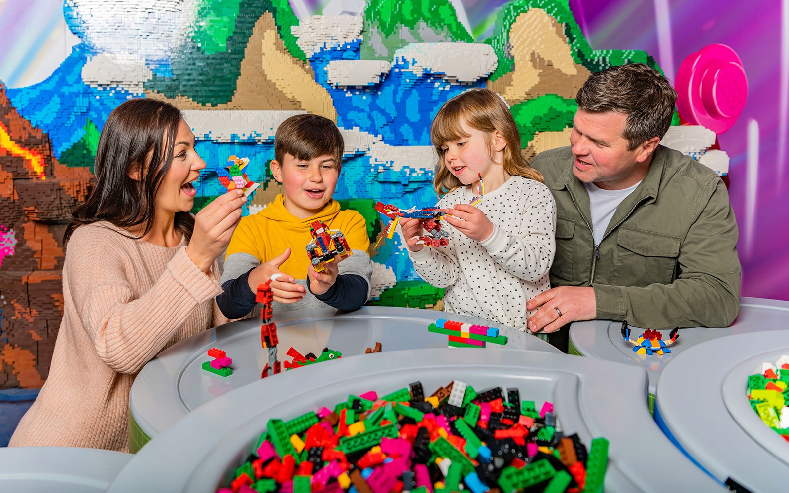 Family building with LEGO bricks at LEGOLAND Windsor Resort.