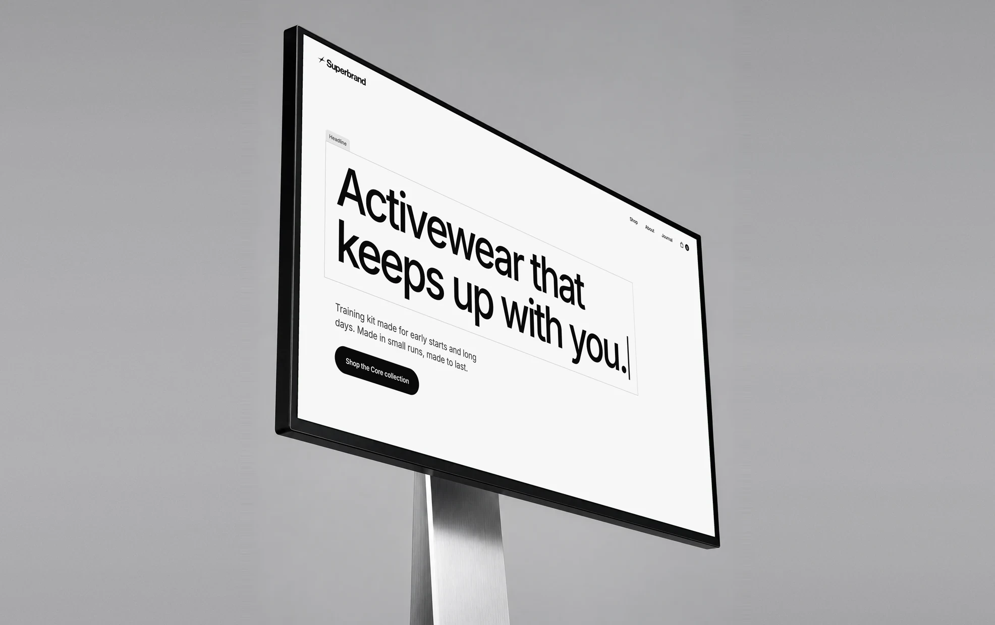 A monitor showing Superbrand’s website: “Activewear that keeps up with you.”