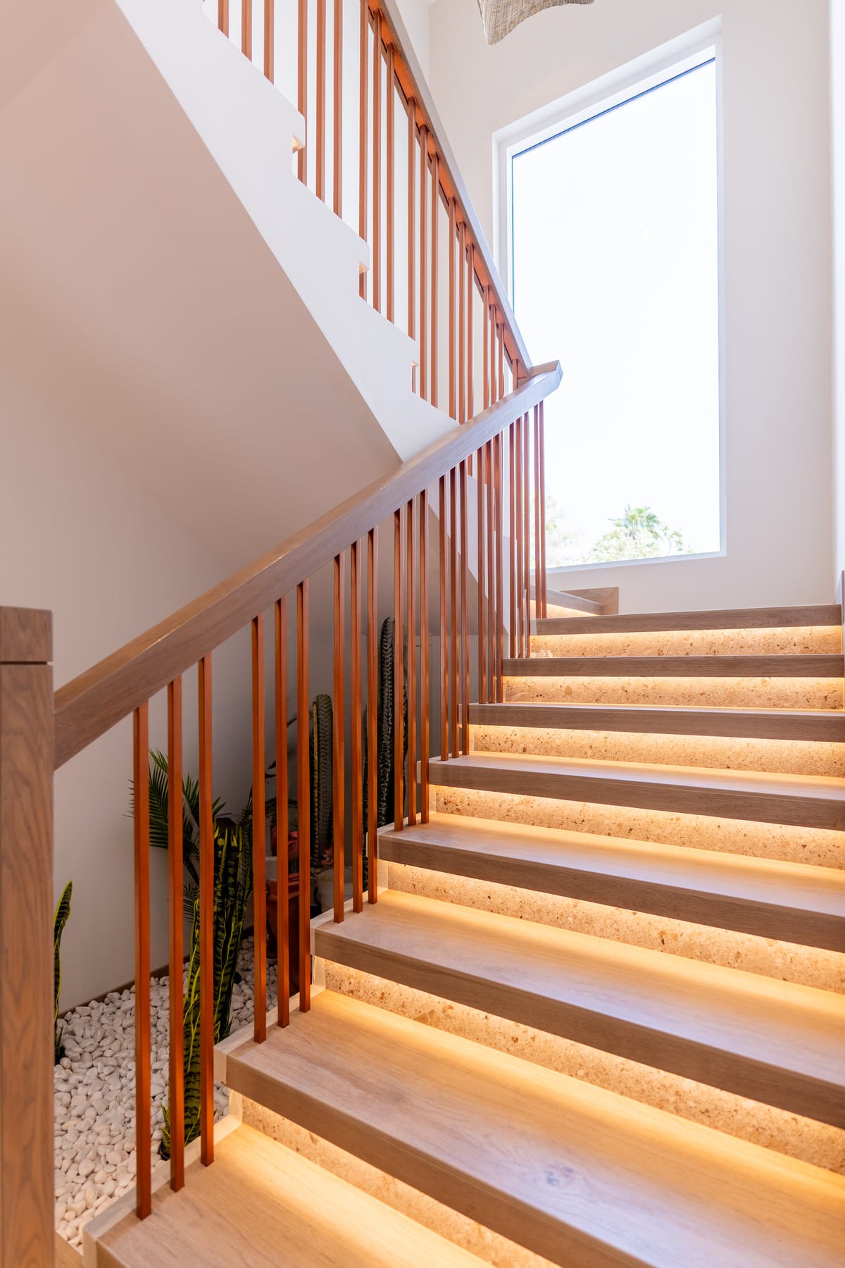 Picture of a staircase with a glass window 