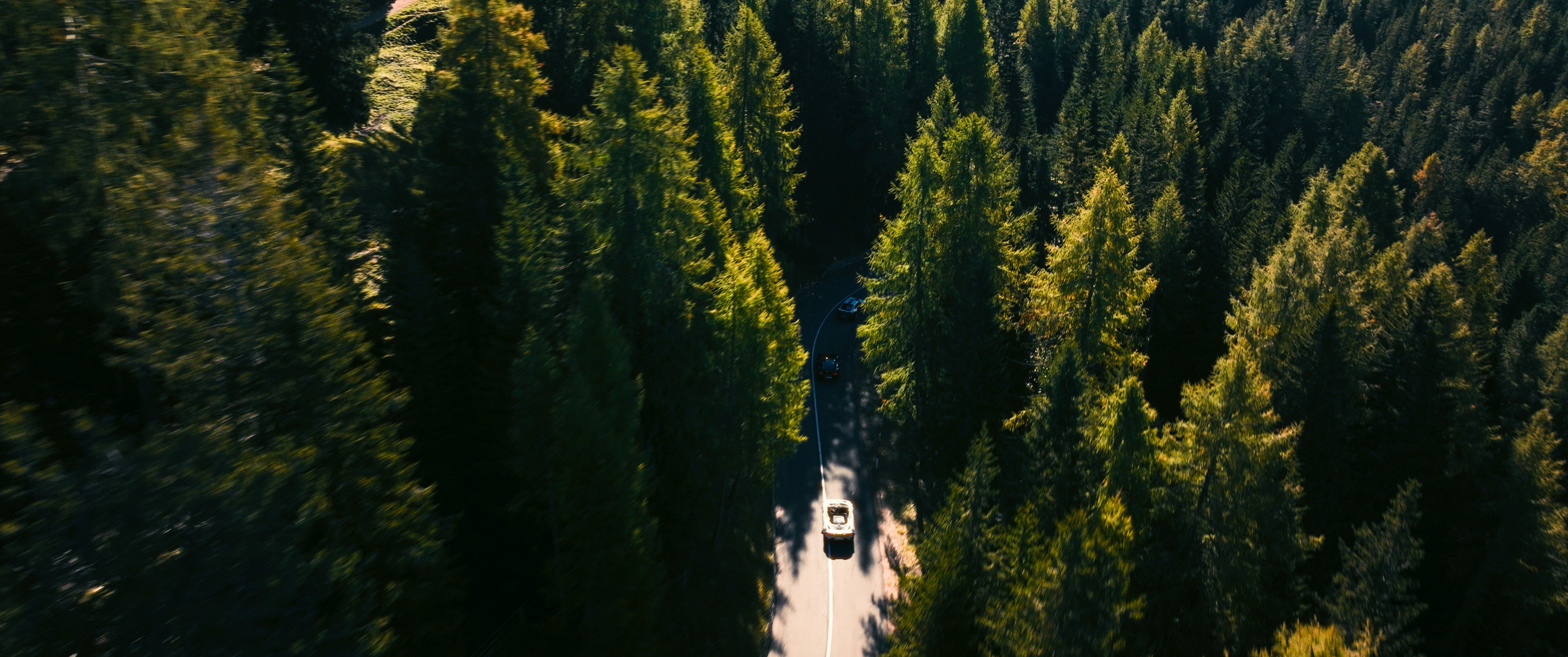 Streetside billboard with flyposters of the Batch.Works brand and illustrations